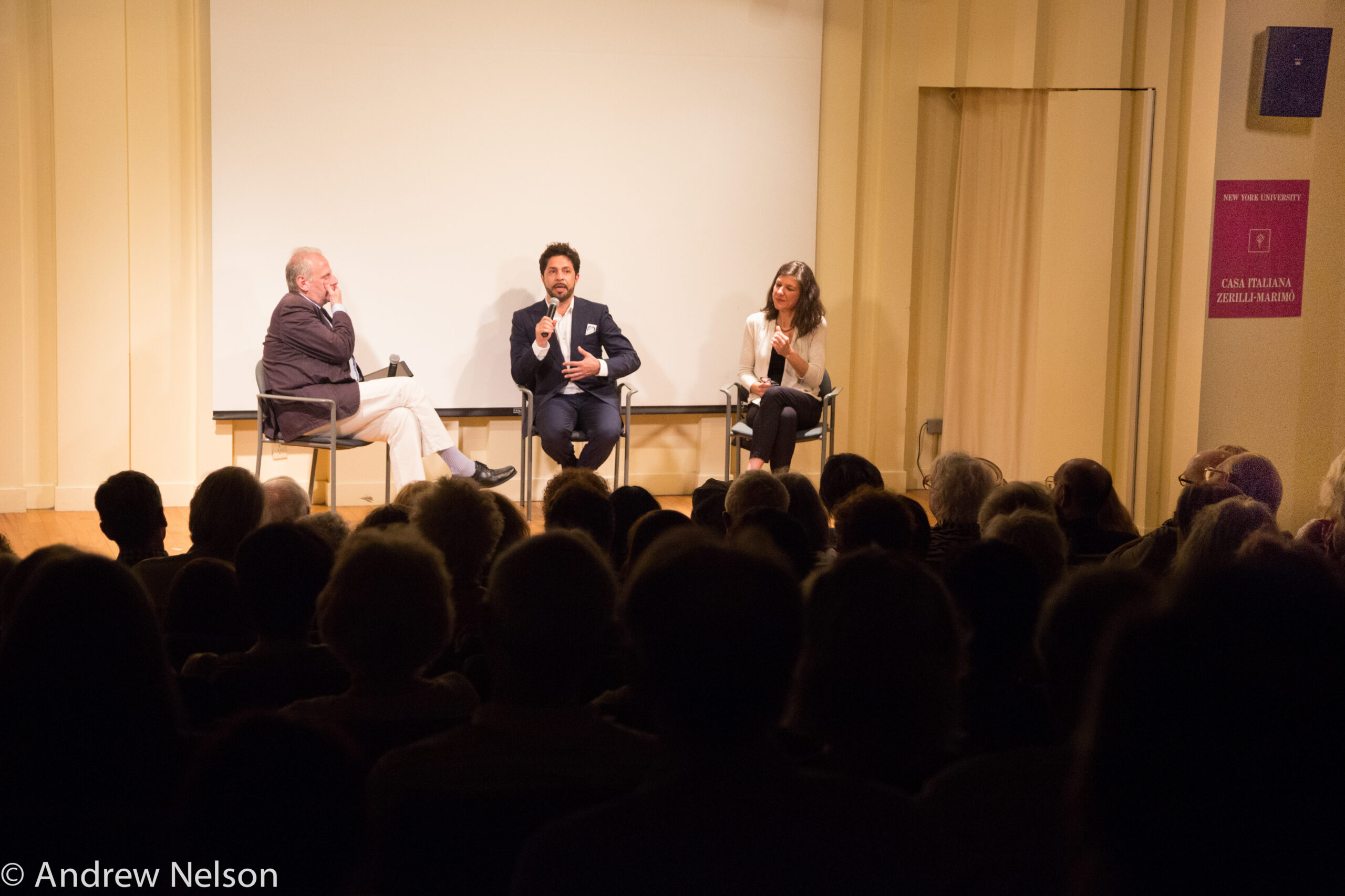 stefano-and-artist-conversing-on-stage-from-rossini-opera-festival-at-casa-italiana