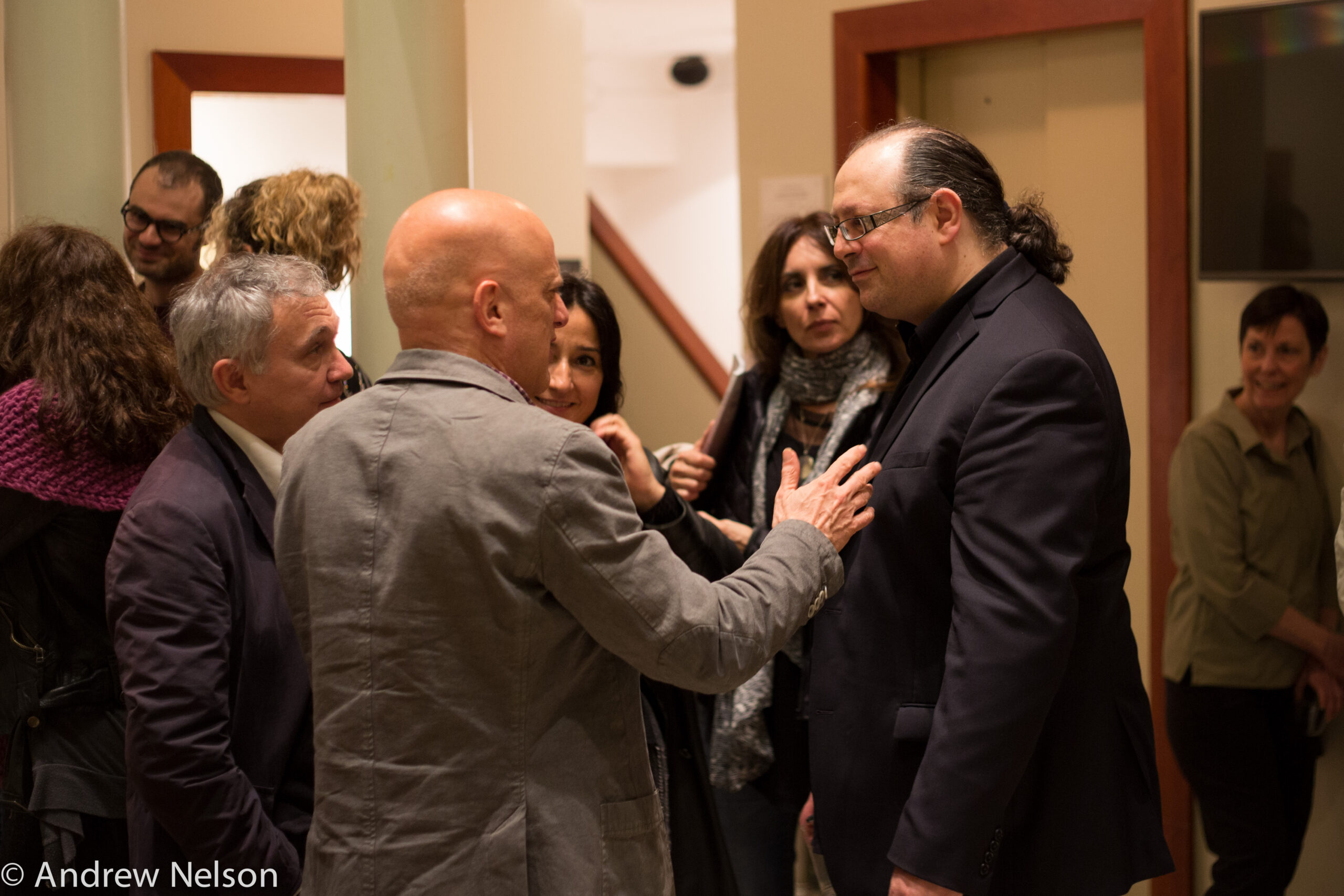 people-interacting-from-exhibition-opening-geppy-pisanelli-at-casa-italiana
