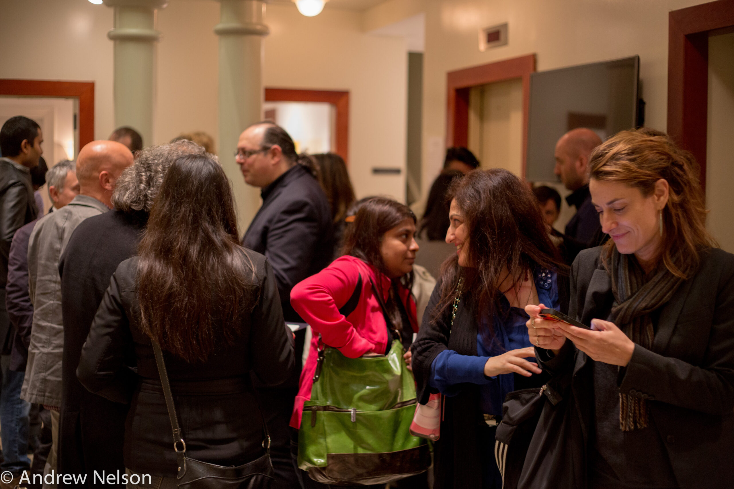 people-interacting-from-exhibition-opening-geppy-pisanelli-at-casa-italiana