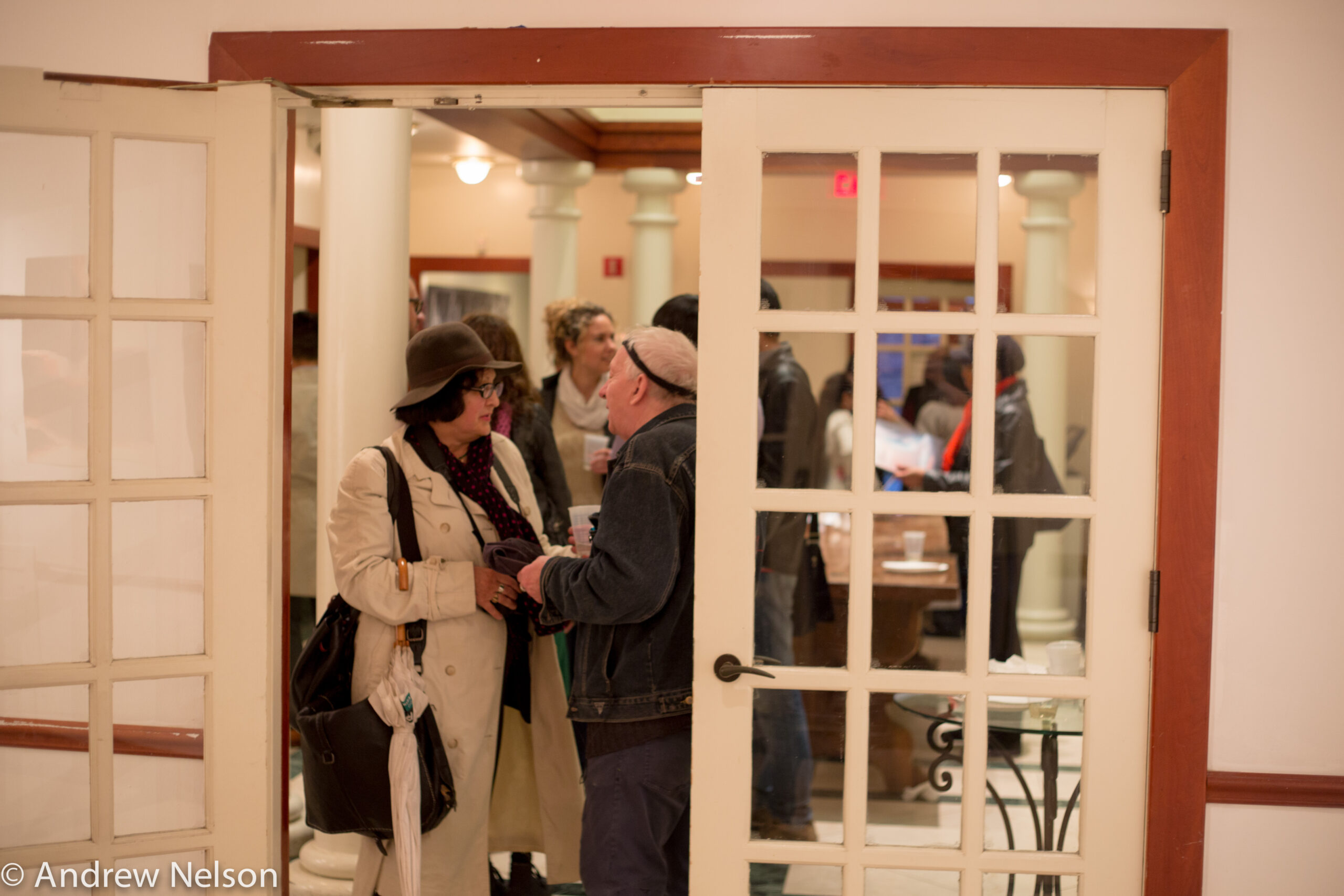 people-interacting-from-exhibition-opening-geppy-pisanelli-at-casa-italiana