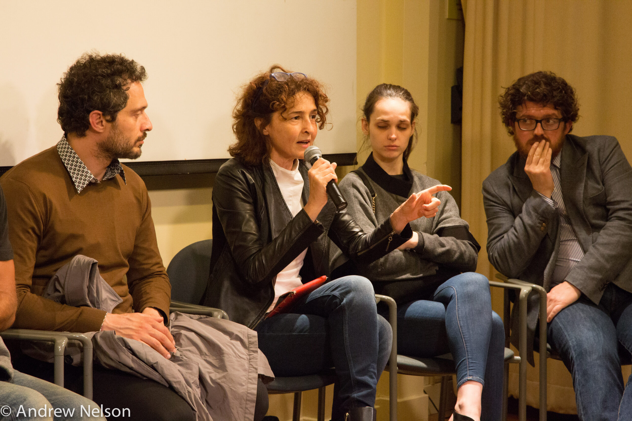 speaker-talking-from-round-table-open-roads-2015-at-casa-italiana