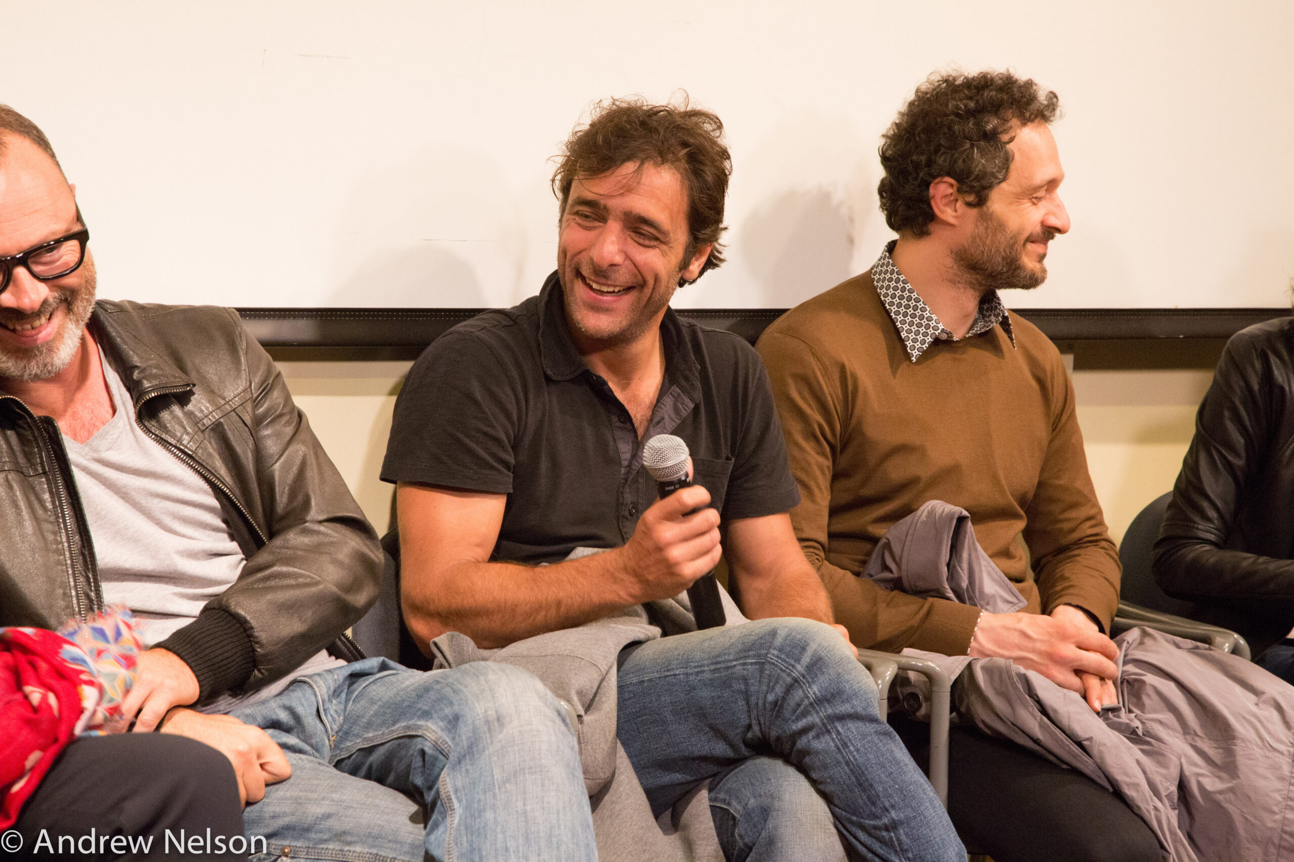 speakers-smiling-from-round-table-open-roads-2015-at-casa-italiana