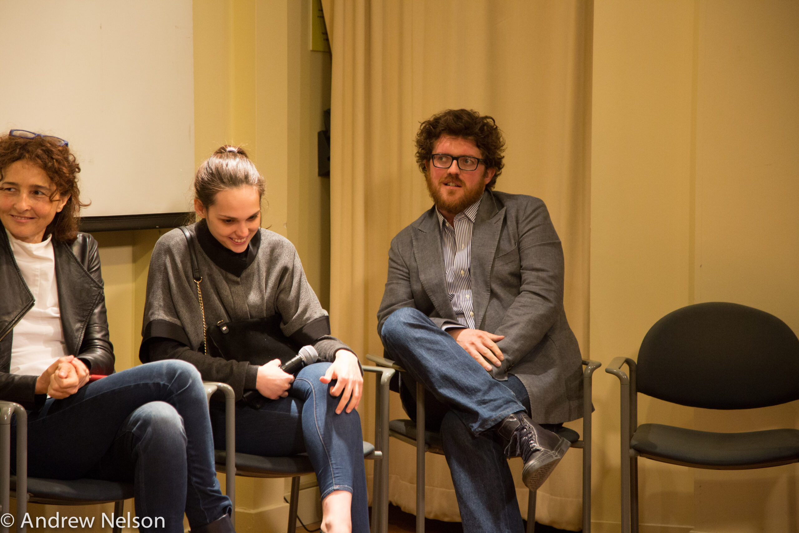 speakers-smiling-from-round-table-open-roads-2015-at-casa-italiana