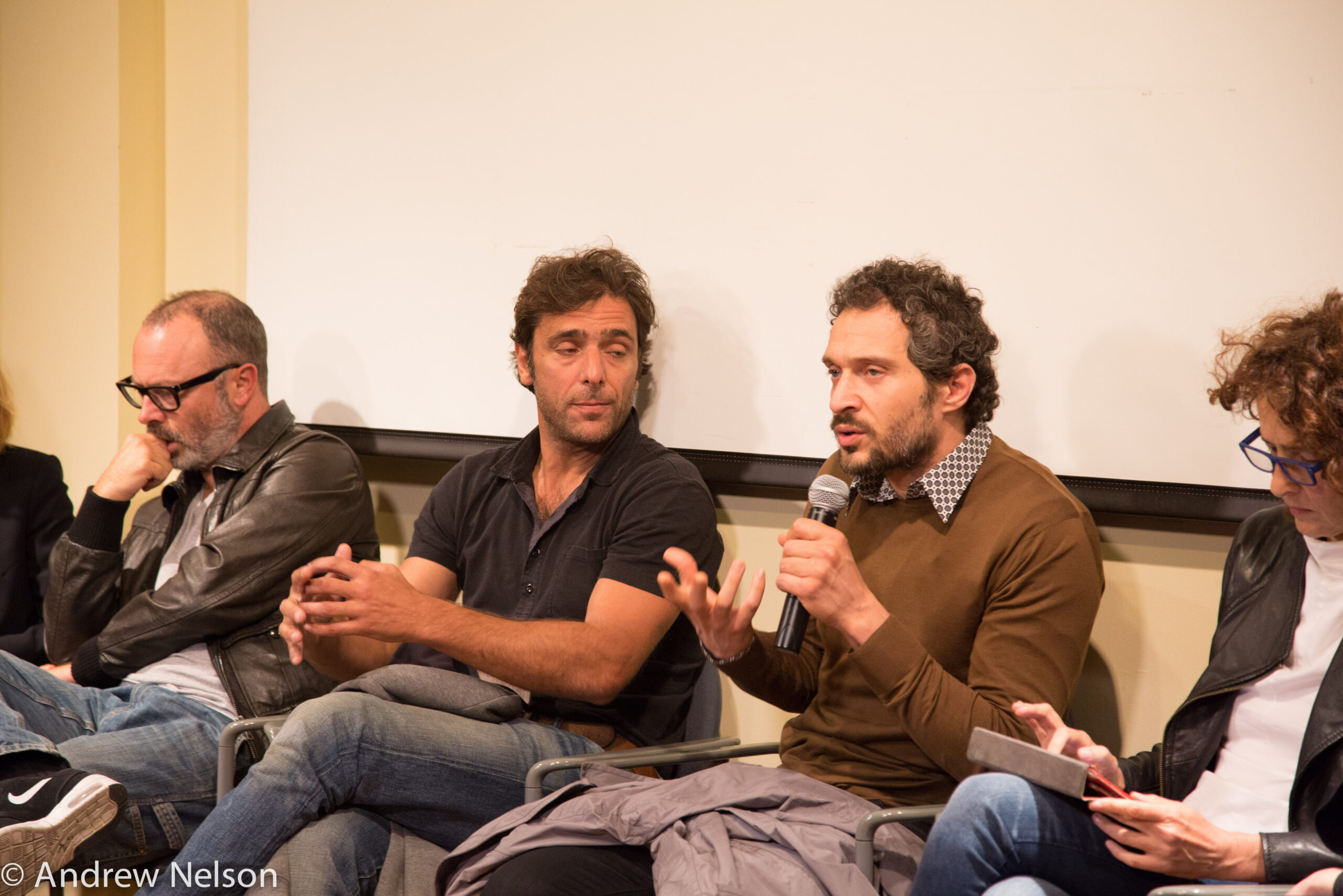 speaker-talking-from-round-table-open-roads-2015-at-casa-italiana