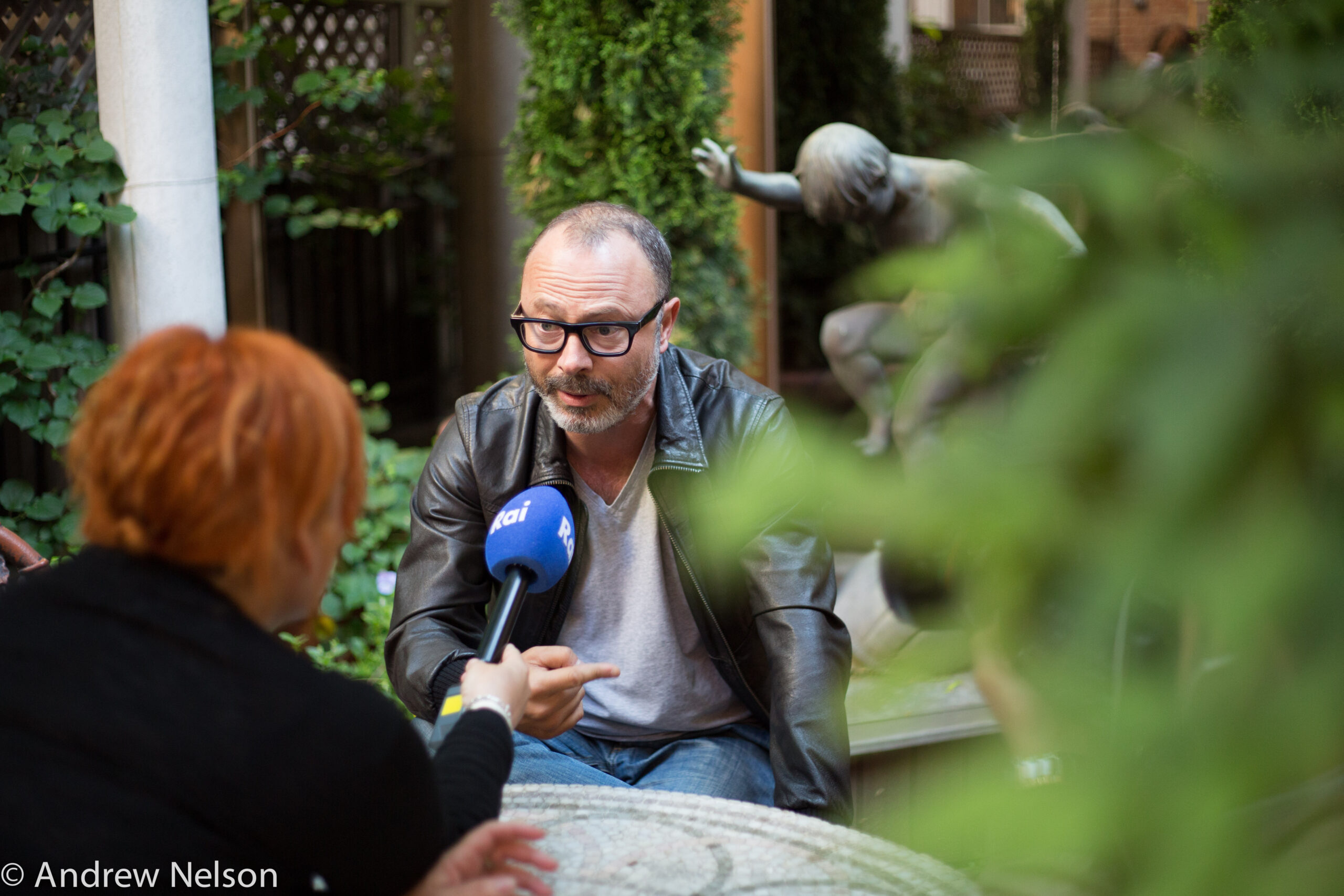 man-being-interviewed-from-round-table-open-roads-2015-at-casa-italiana