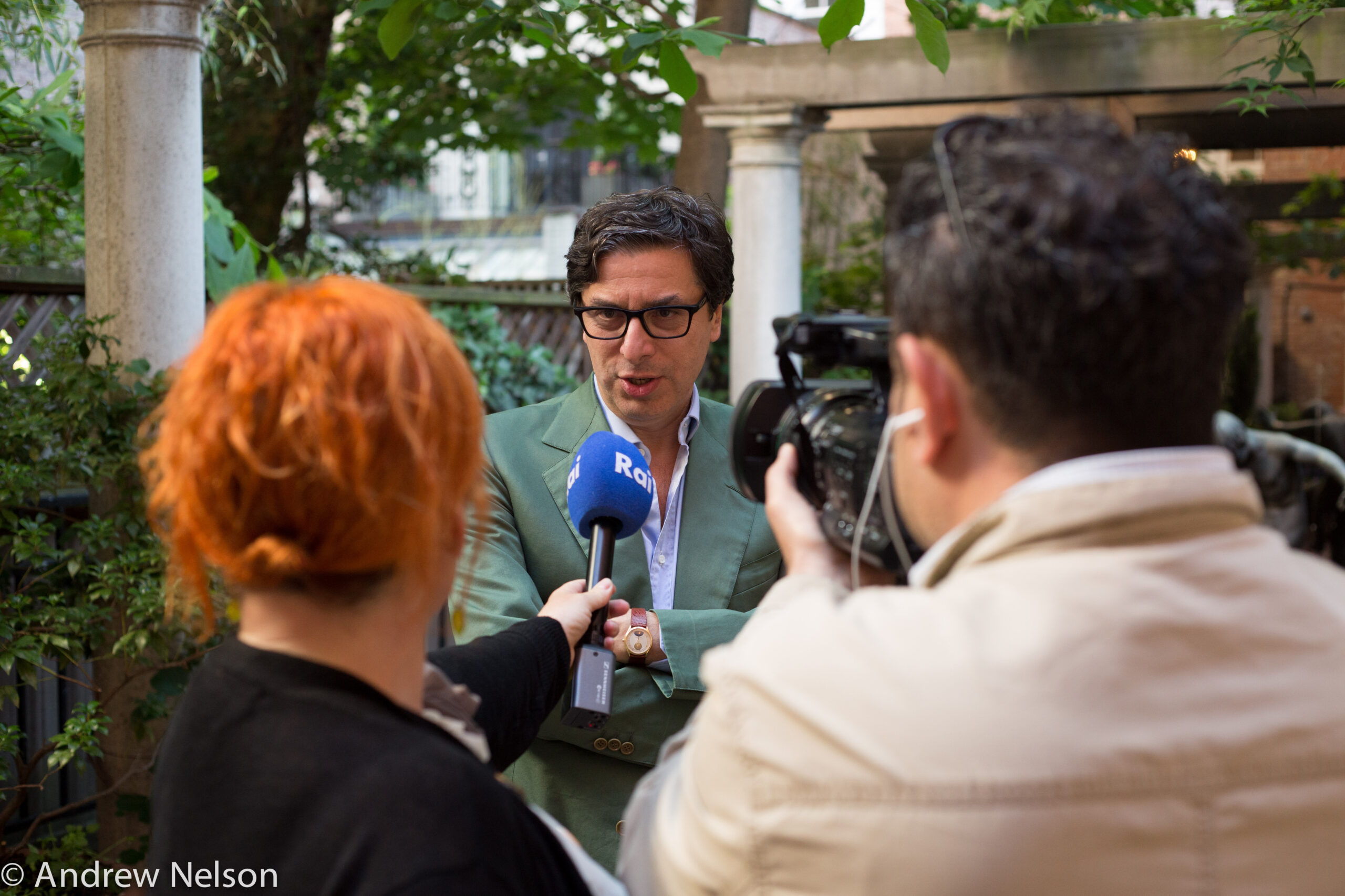 man-being-interviewed-from-round-table-open-roads-2015-at-casa-italiana