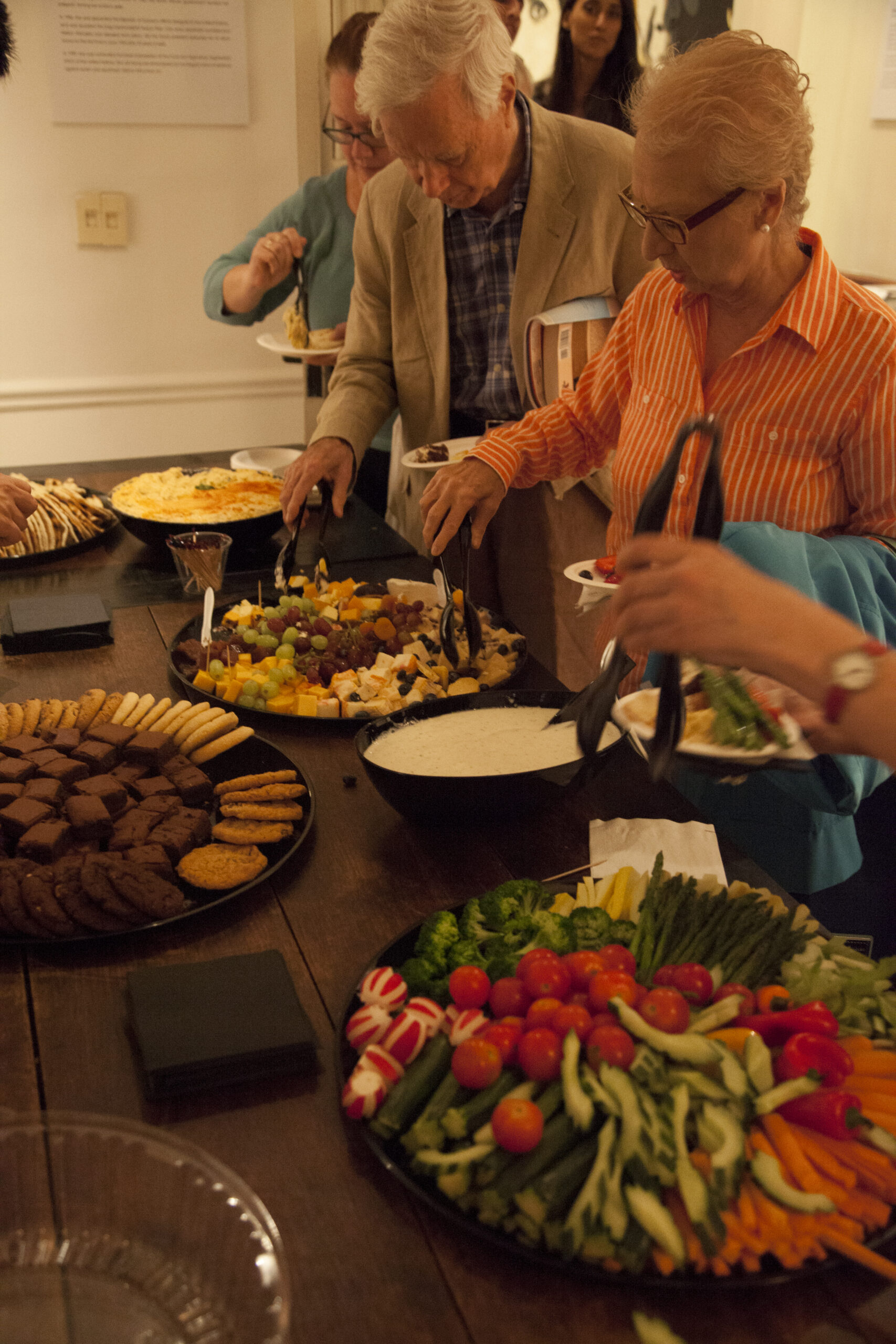 guests-having-food-from-book-presentation-an-unlikely-union-at-casa-italiana