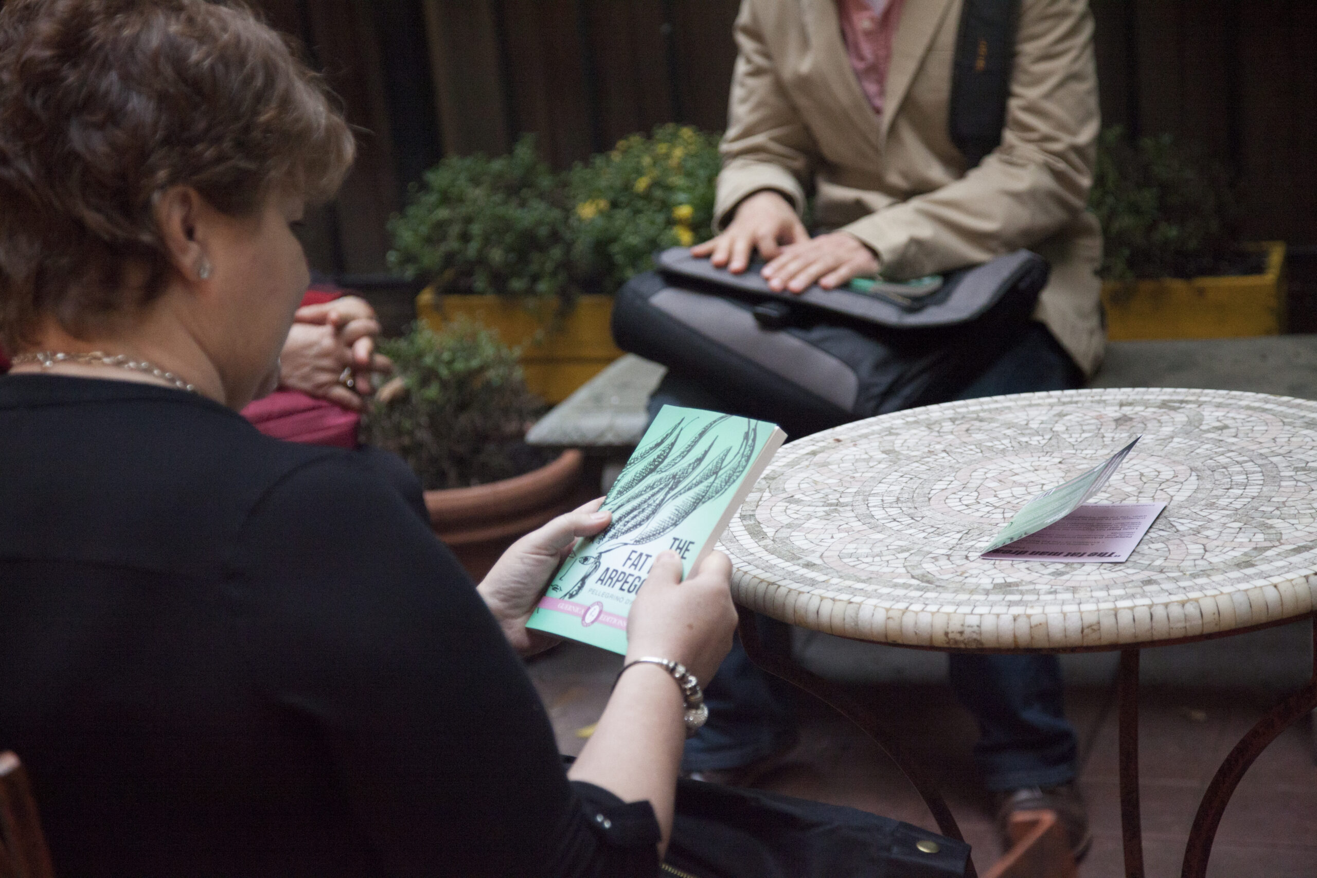 lady-with-book-from-diffraction-exhibition-opening-and-the-fat-man-arpeggios-book-pres-at-casa-italiana