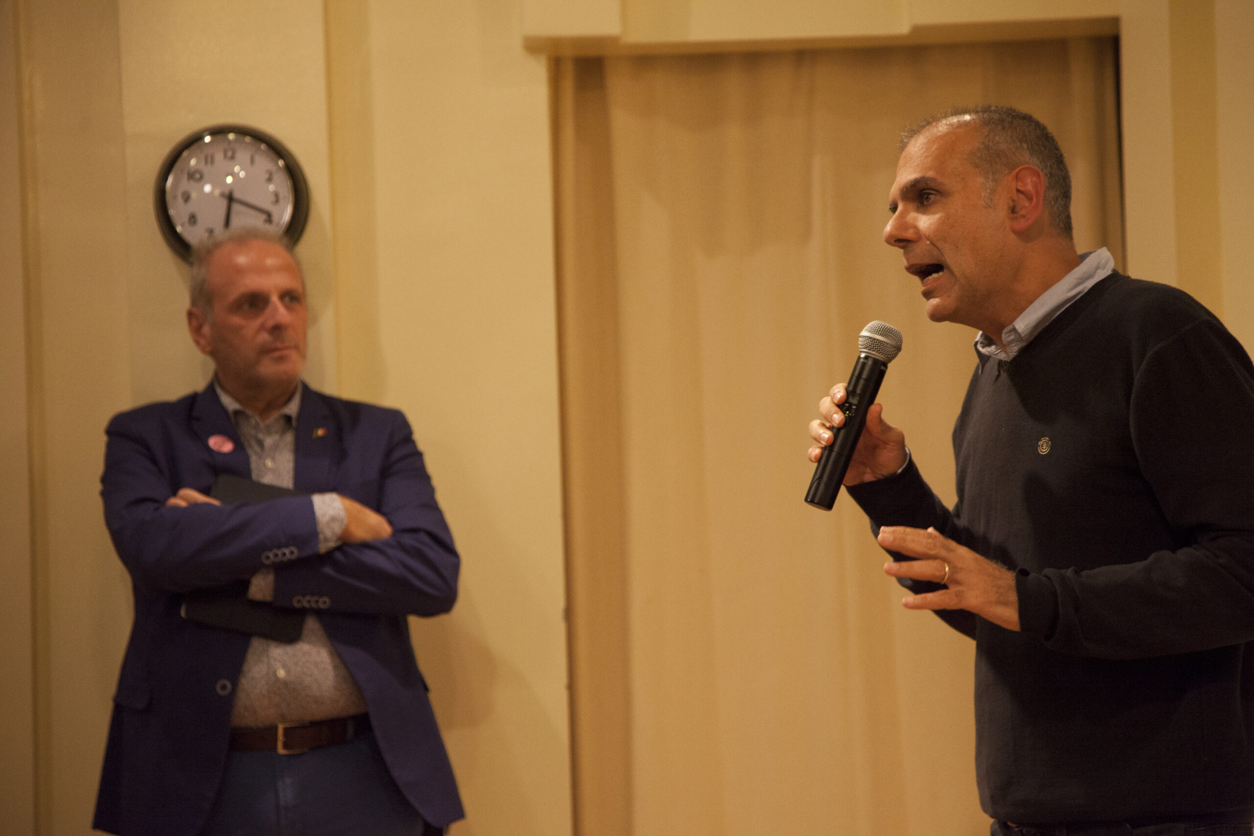 speaker-talking-and-stefano-standing-from-leopardi-at-casa-italiana