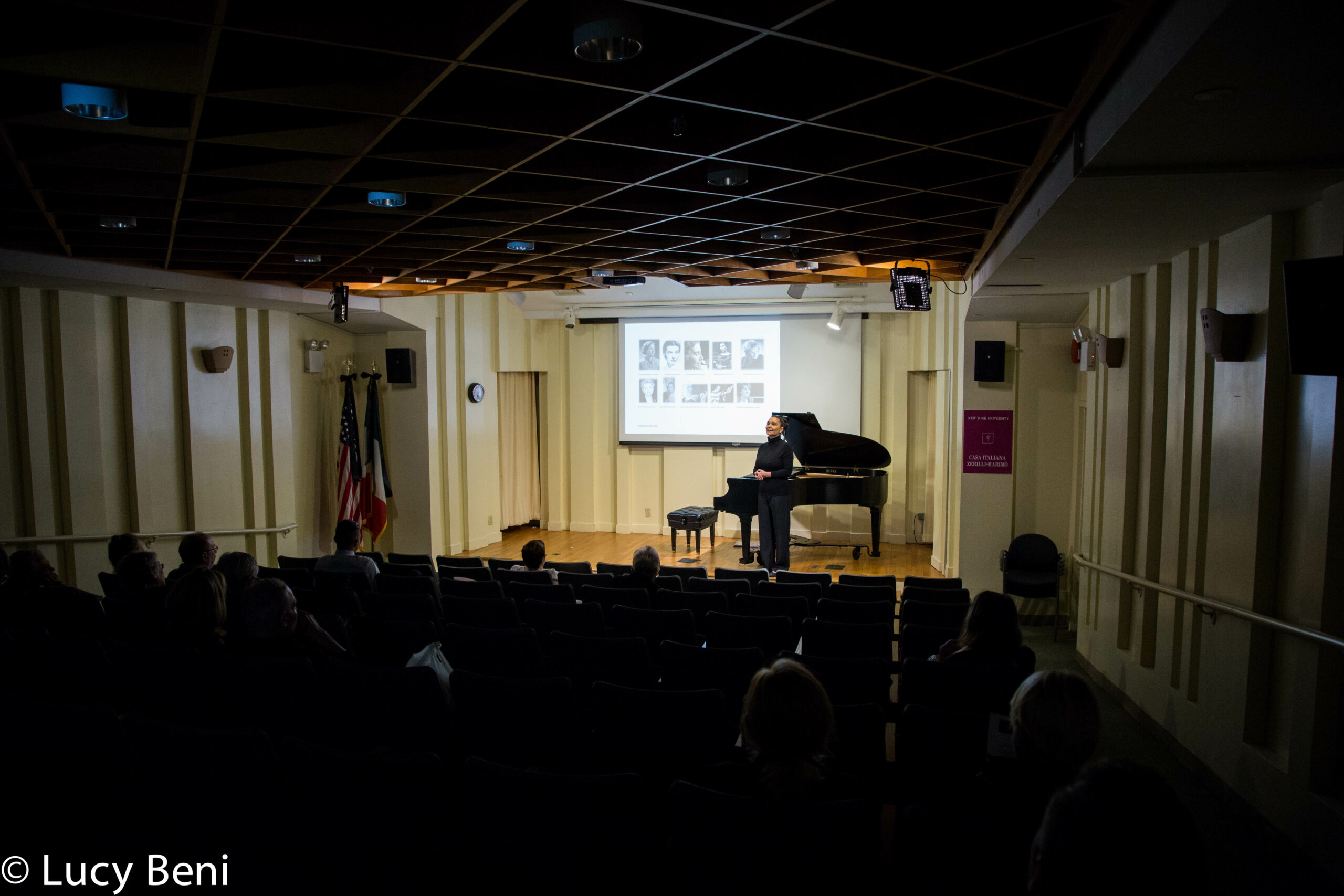 musician-talking-to-audience-from-concert-alessandra-garosi-novecento-at-casa-italiana