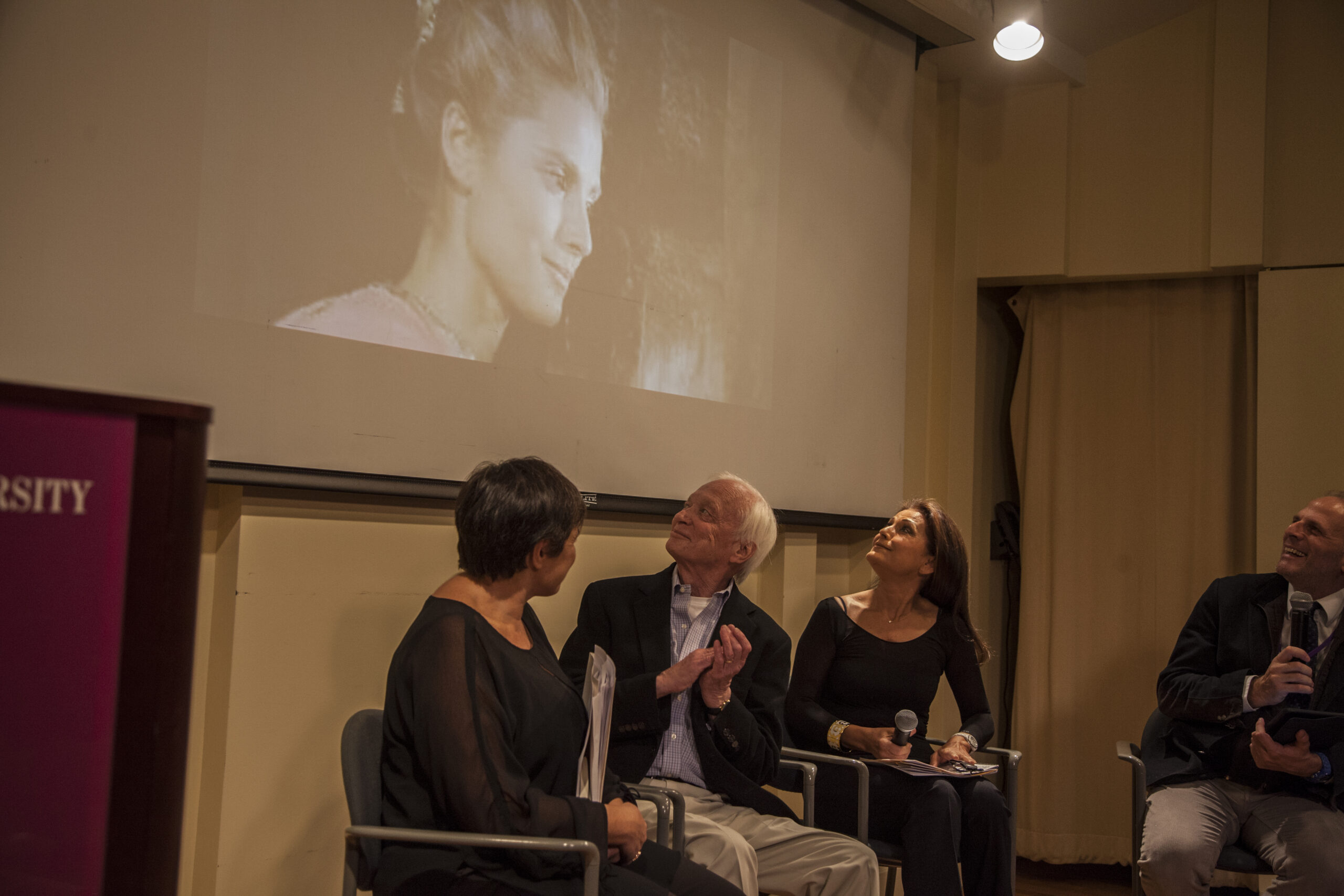 stefano-and-speaker-looking-at-the-projector-screen-from-pasolini-at-casa-italiana