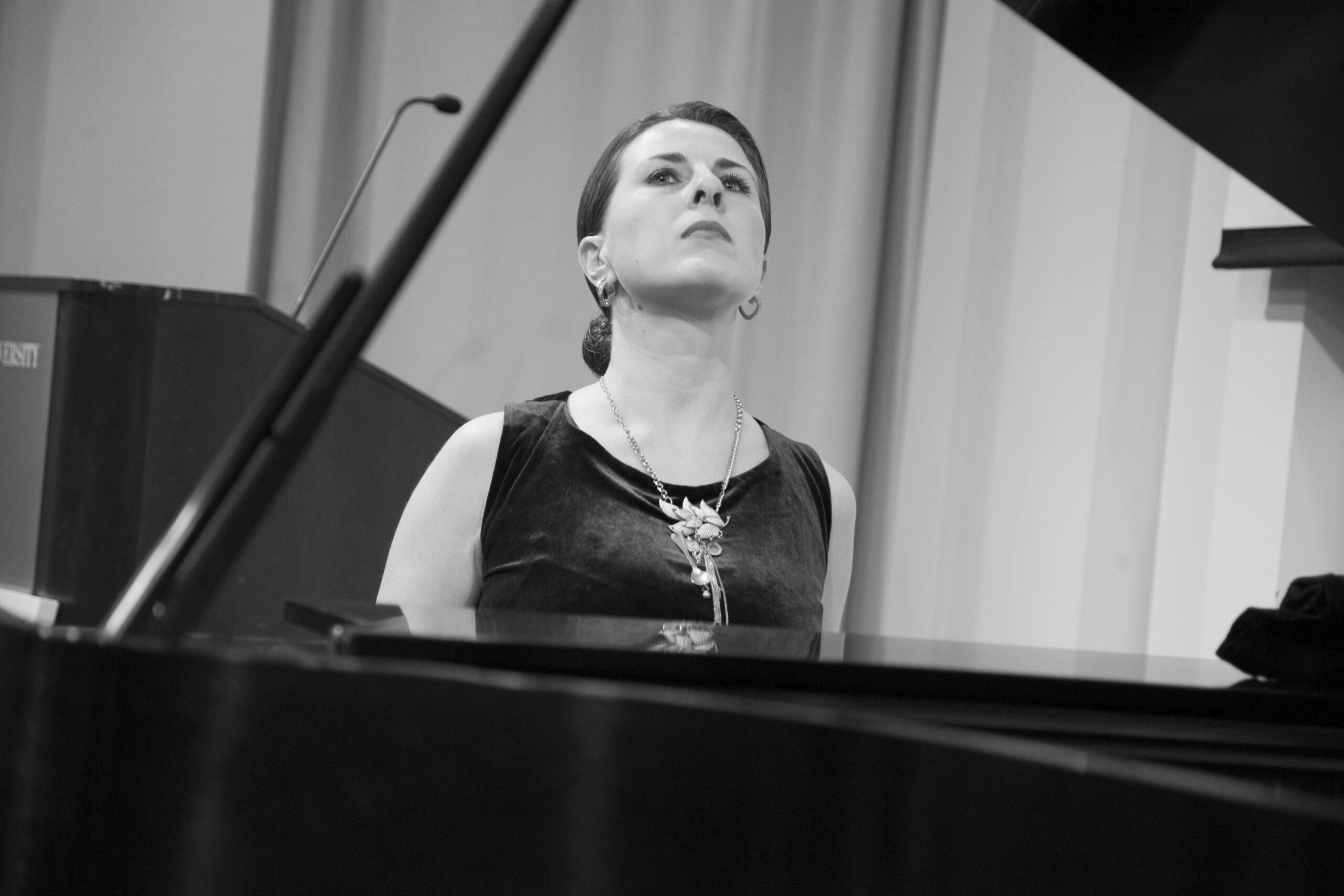 musician-playing-piano-from-a-tribute-in-words-and-music-for-baroness-mariuccia-zerilli-marim-at-casa-italiana