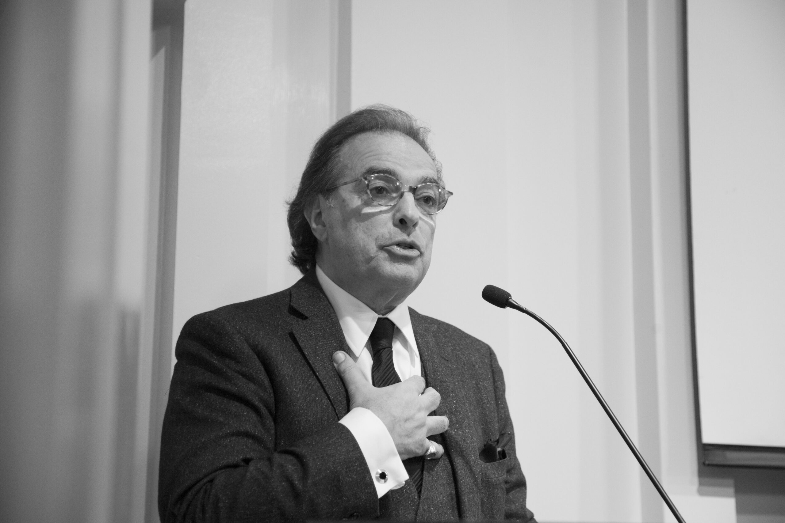 speaker-talking-from-a-tribute-in-words-and-music-for-baroness-mariuccia-zerilli-marim-at-casa-italiana