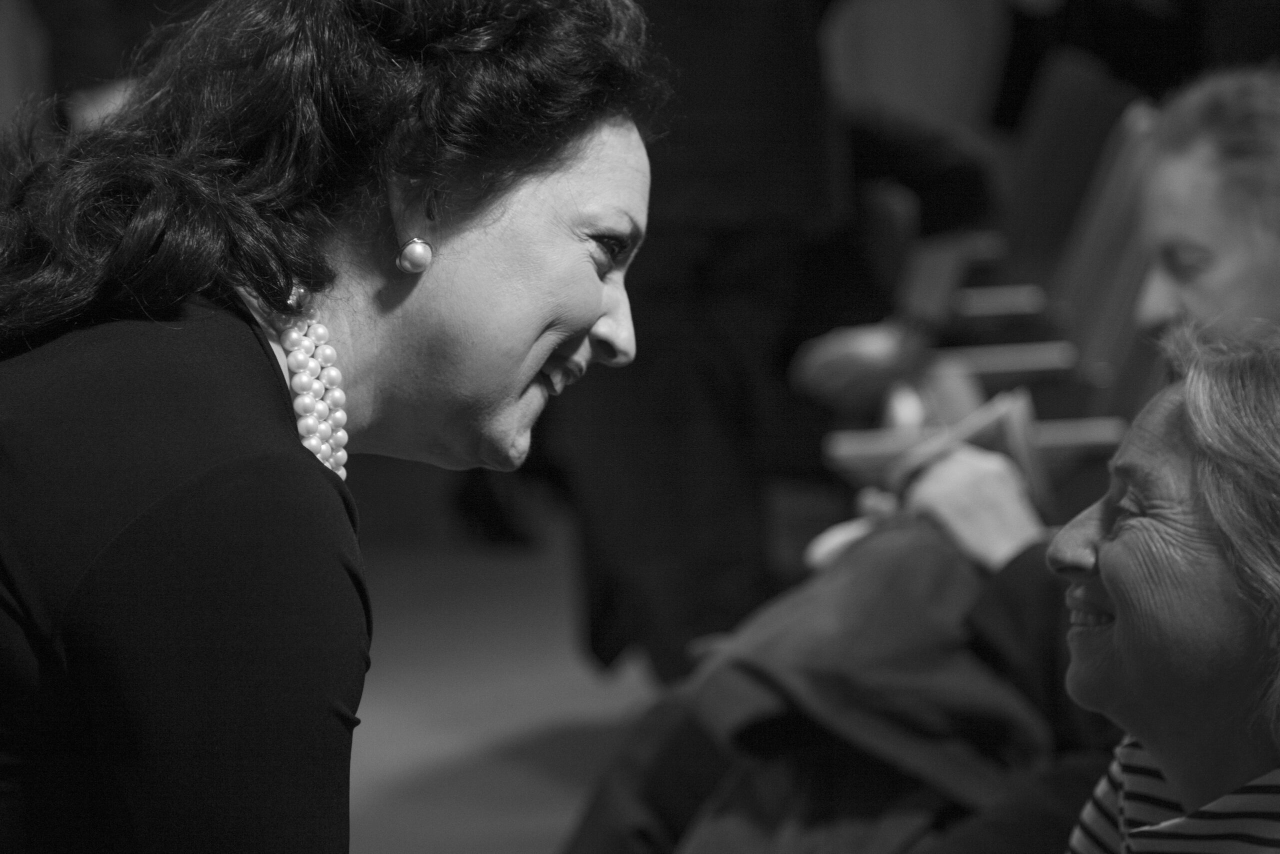 lady-smiling-from-a-tribute-in-words-and-music-for-baroness-mariuccia-zerilli-marim-at-casa-italiana
