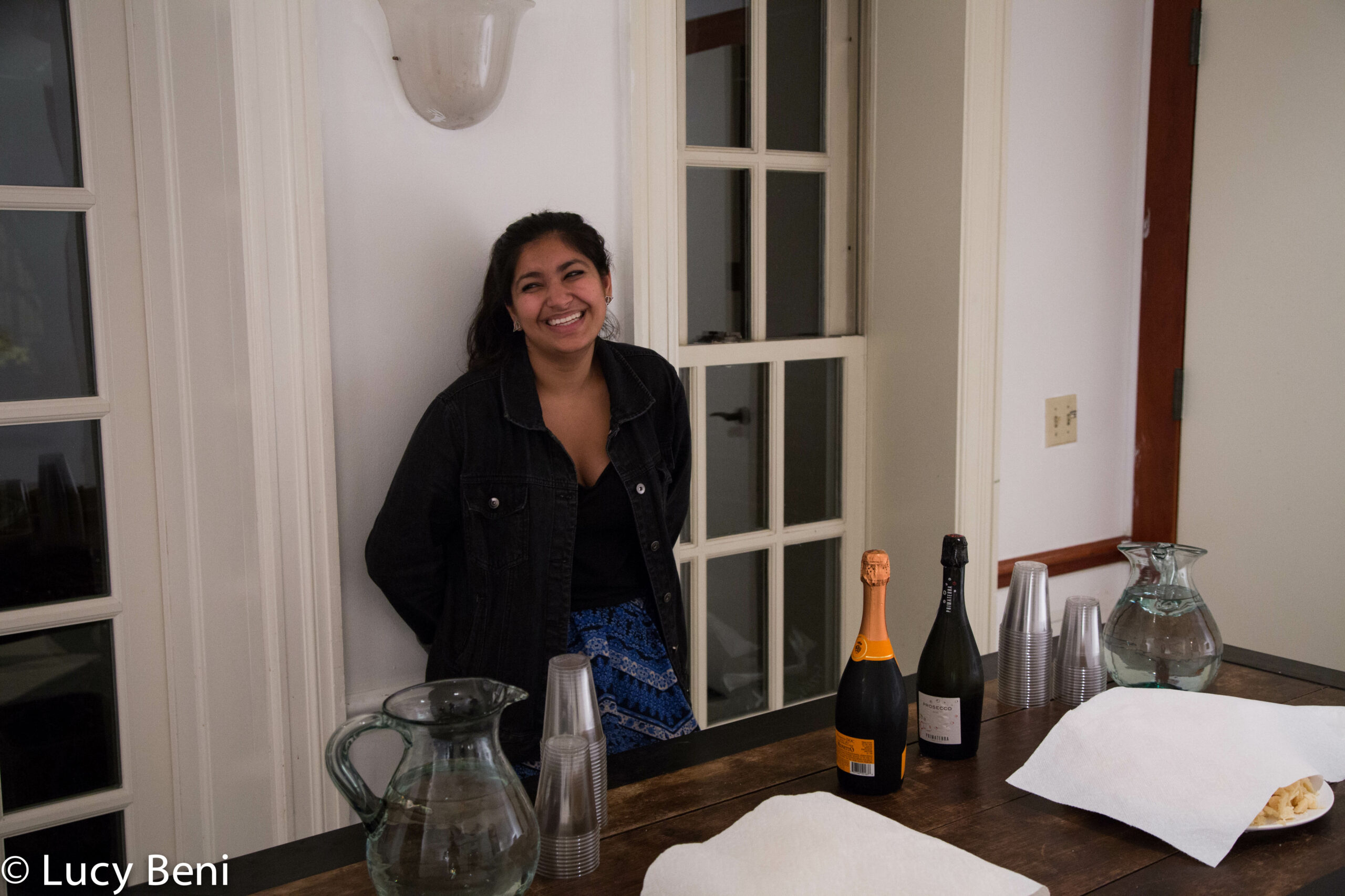 girl-smiling-from-exhibiton-opening-works-by-roberto-almagno-at-casa-italiana