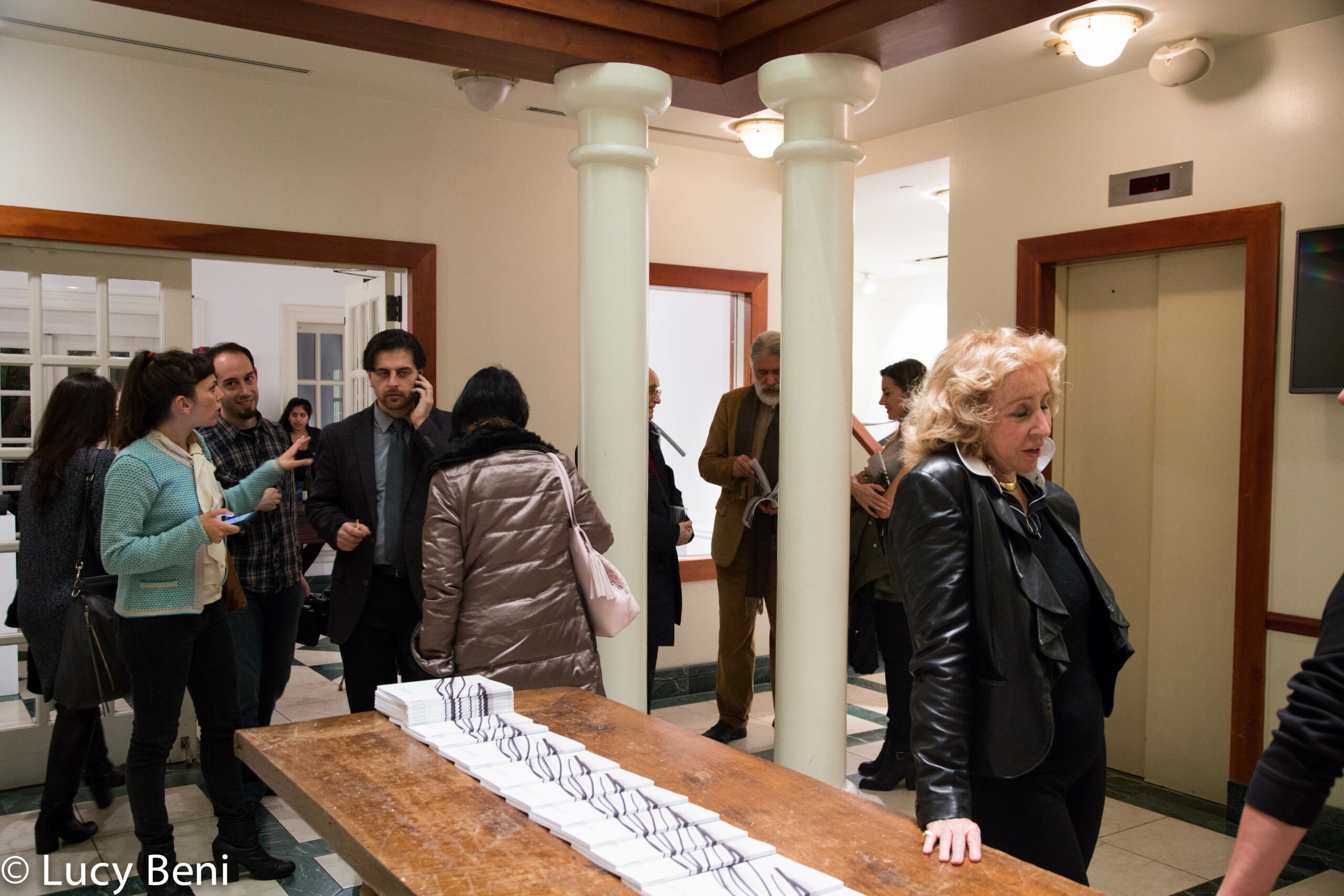 kostja-julian-and-people-interacting-from-exhibiton-opening-works-by-roberto-almagno-at-casa-italiana