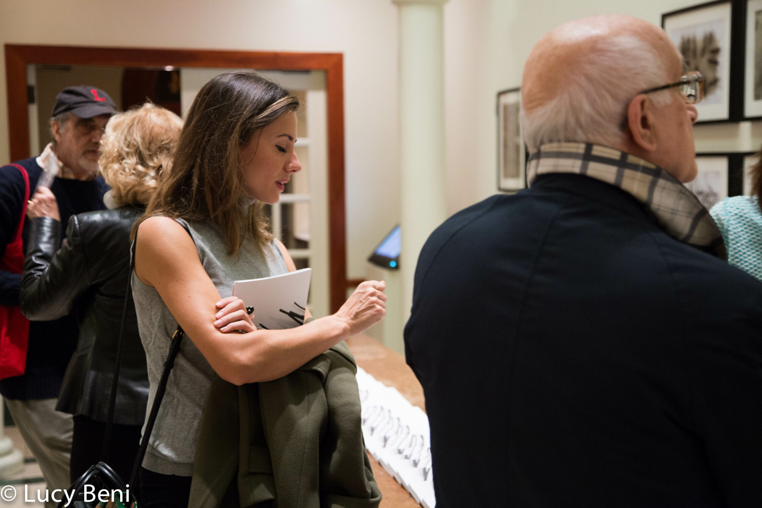 people-seeing-exhibit-from-exhibiton-opening-works-by-roberto-almagno-at-casa-italiana