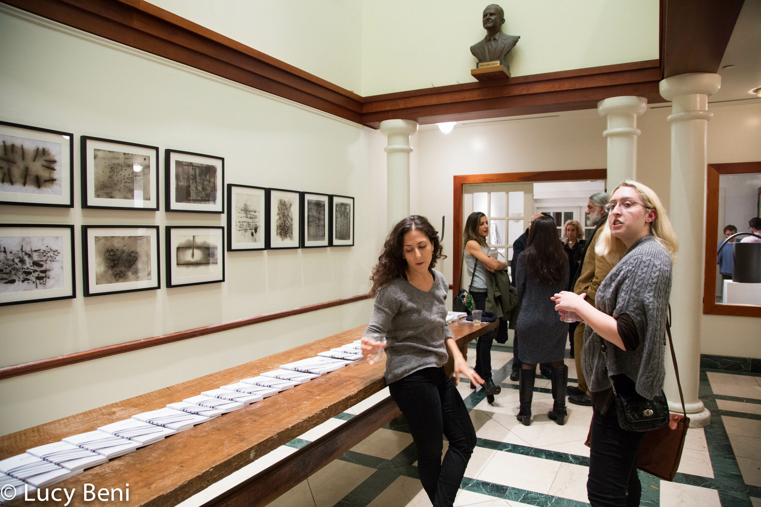 people-interacting-from-exhibiton-opening-works-by-roberto-almagno-at-casa-italiana