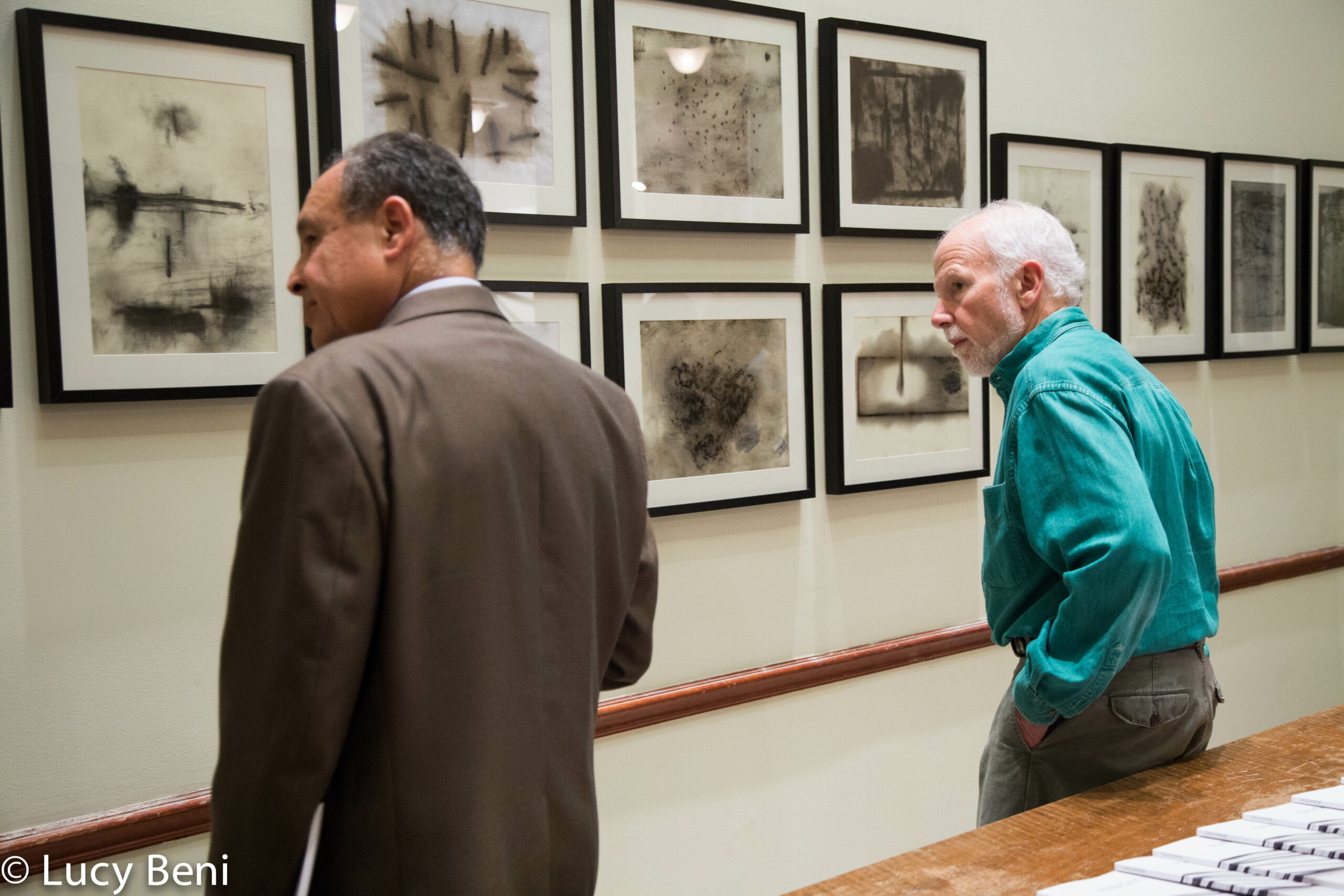 people-seeing-exhibit-from-exhibiton-opening-works-by-roberto-almagno-at-casa-italiana