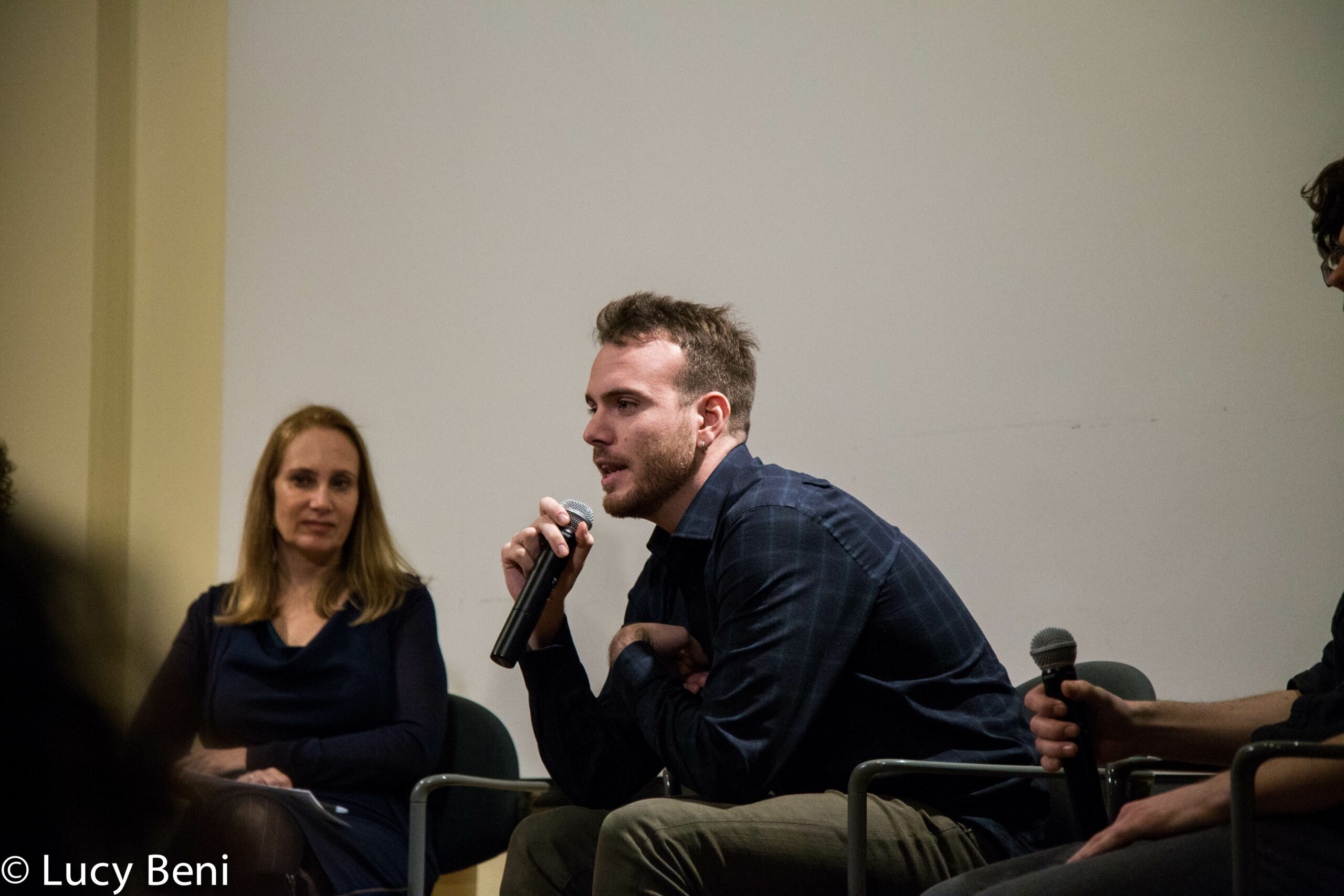 director-talking-from-screening-if-only-i-were-that-warrior-at-casa-italiana