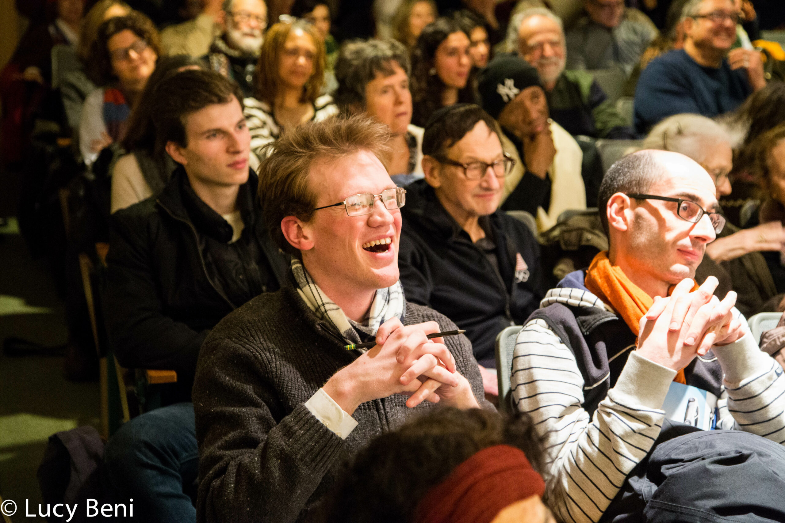 spectators-smiling-from-screening-if-only-i-were-that-warrior-at-casa-italiana
