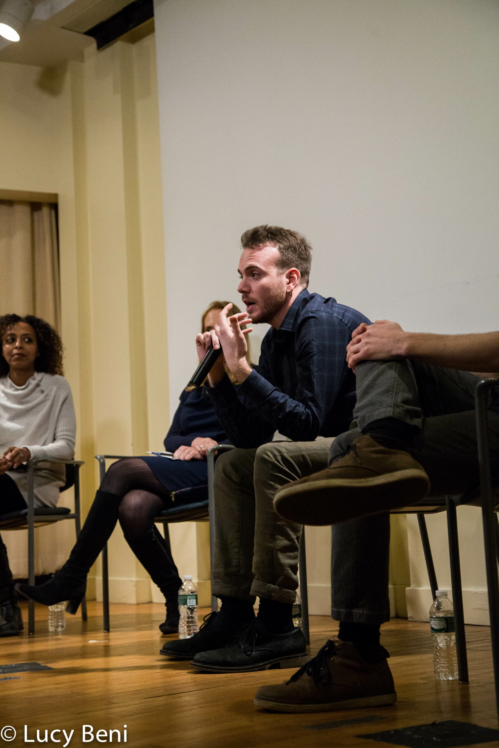 director-talking-from-screening-if-only-i-were-that-warrior-at-casa-italiana