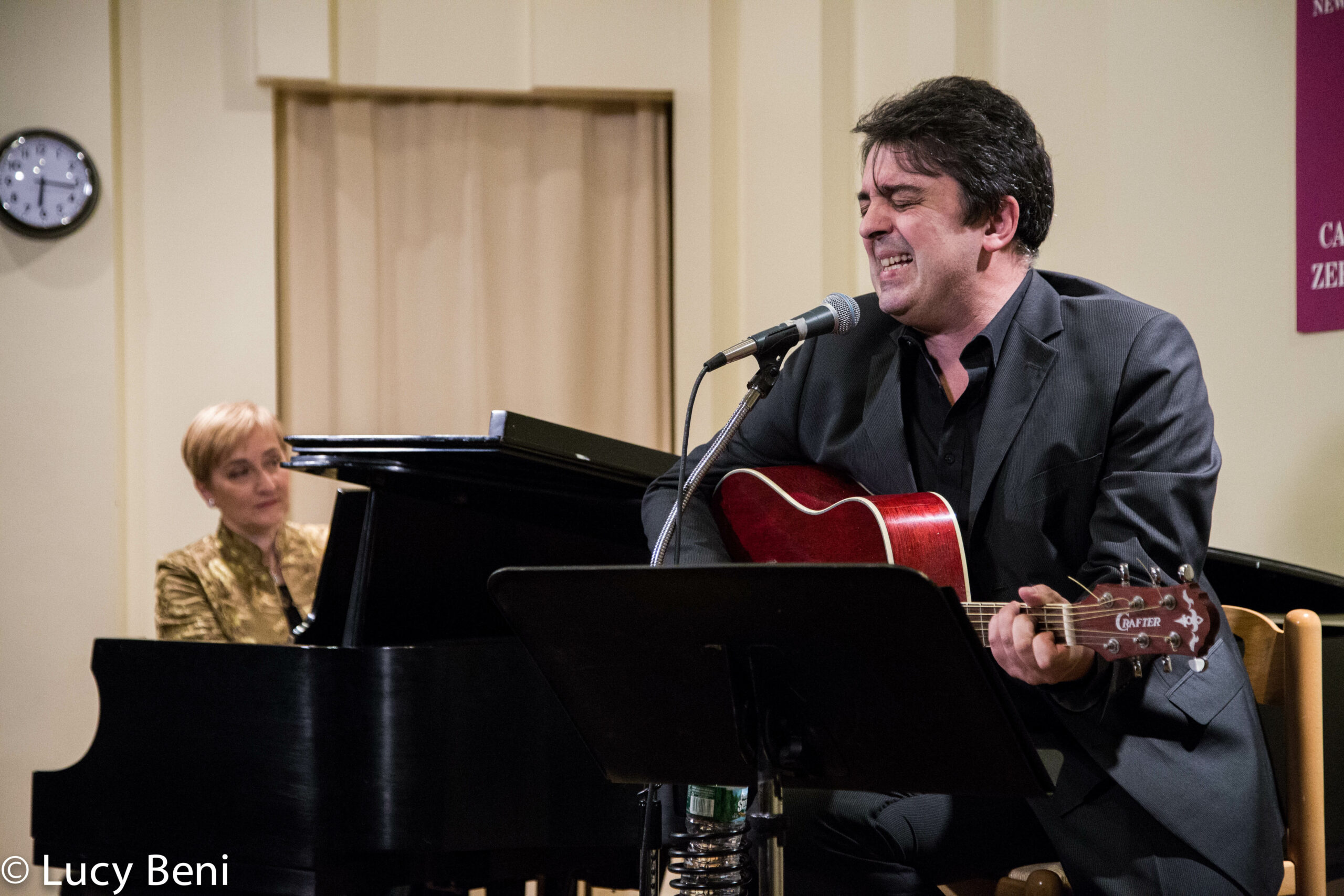 musician-performing-from-concert-luigi-faber-genova-at-casa-italiana