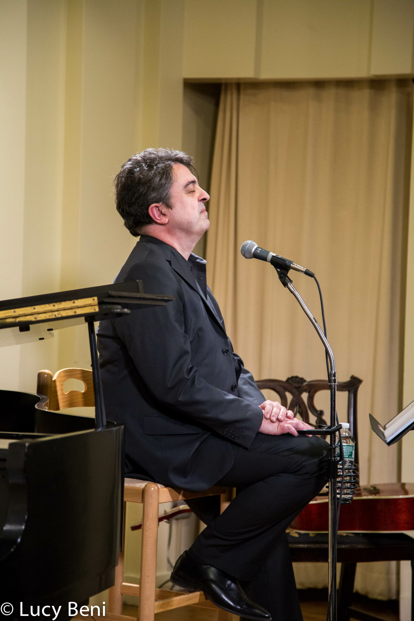 musician-performing-from-concert-luigi-faber-genova-at-casa-italiana