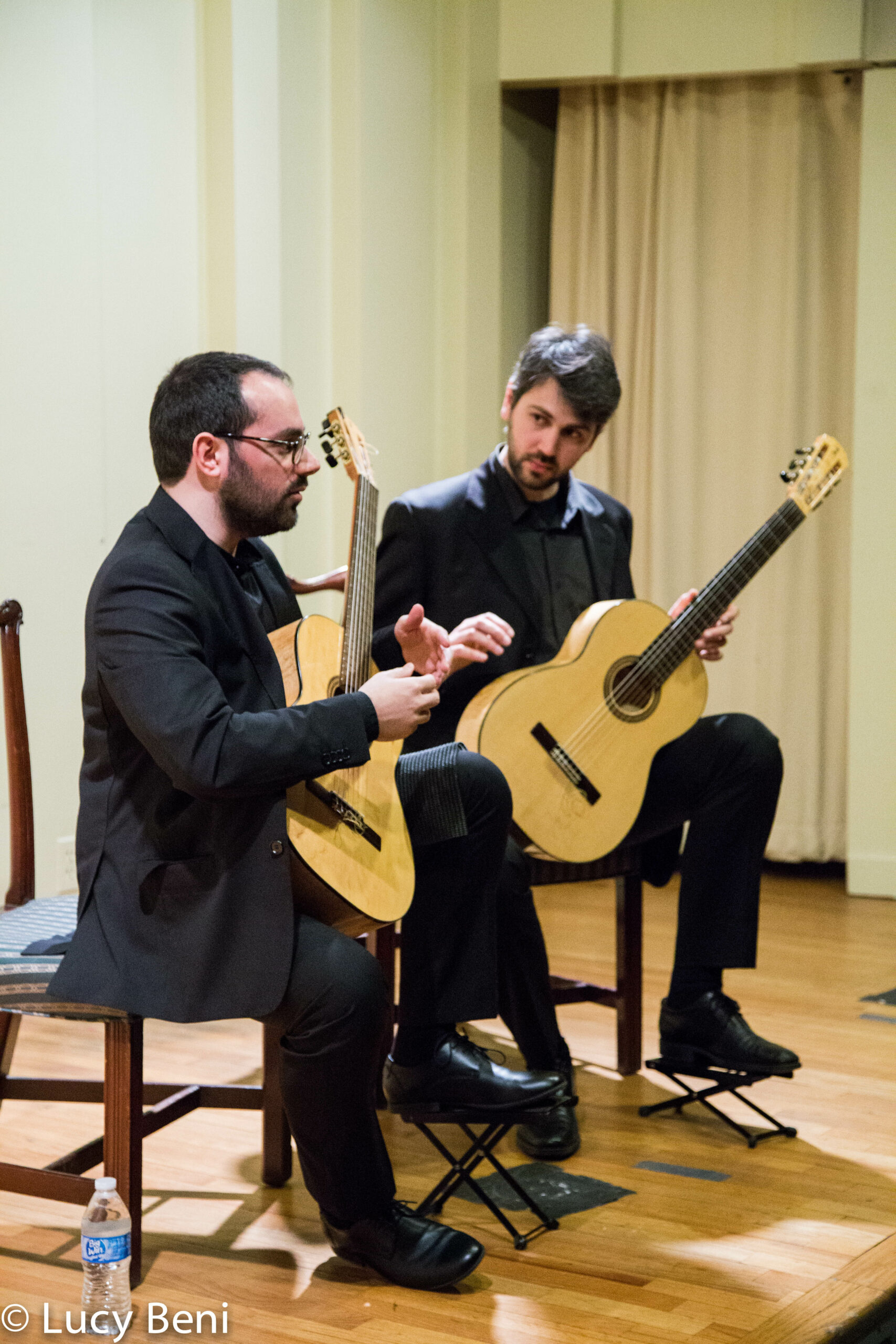 musician-talking-from-concert-duo-scarlatti-guitar-duo-at-casa-italiana