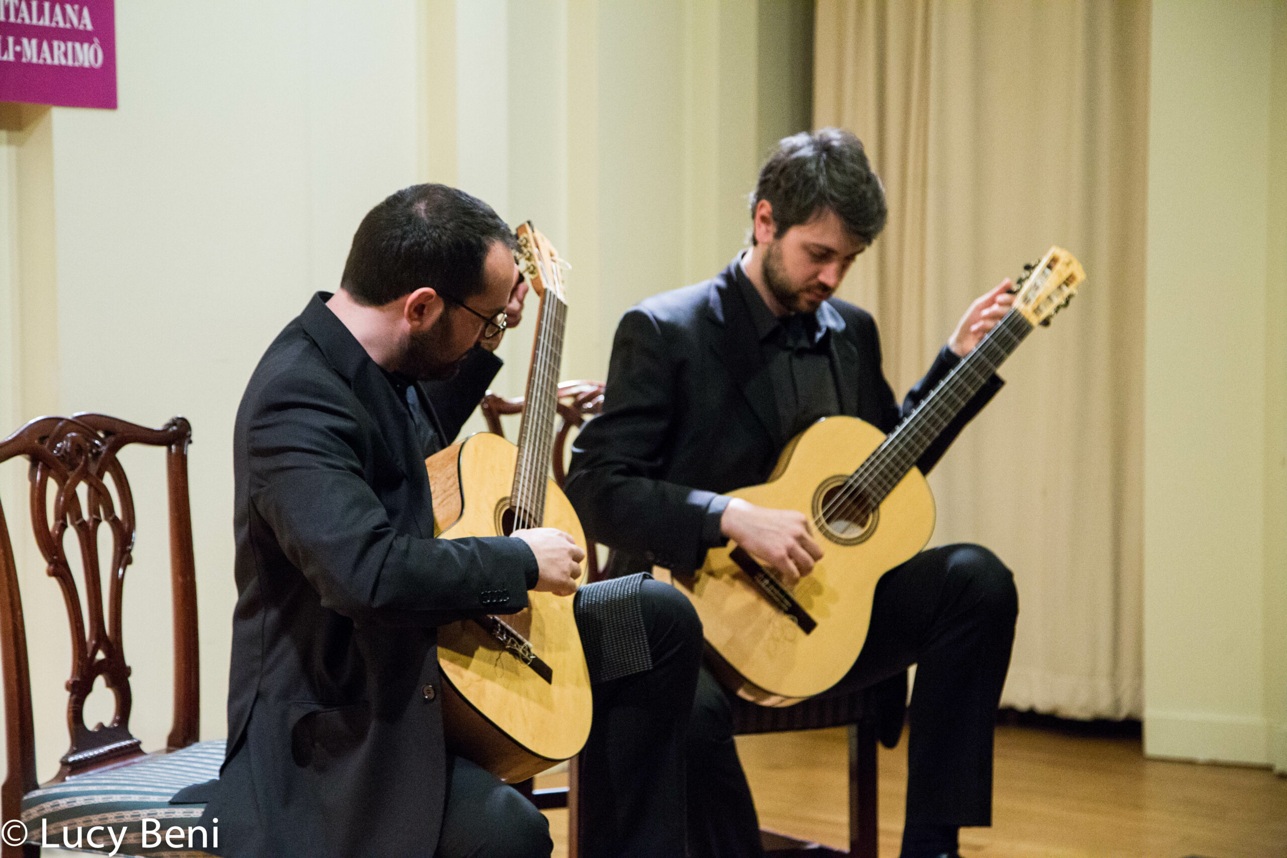 musician-playing-guitar-from-concert-duo-scarlatti-guitar-duo-at-casa-italiana