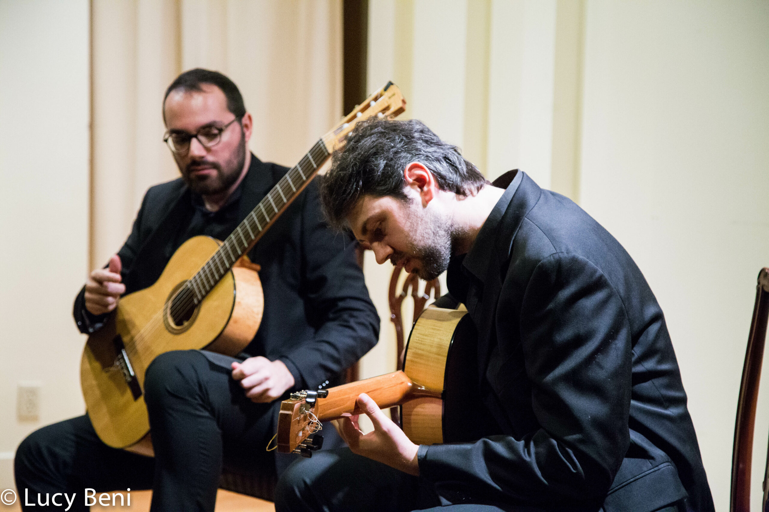 musician-playing-guitar-from-concert-duo-scarlatti-guitar-duo-at-casa-italiana