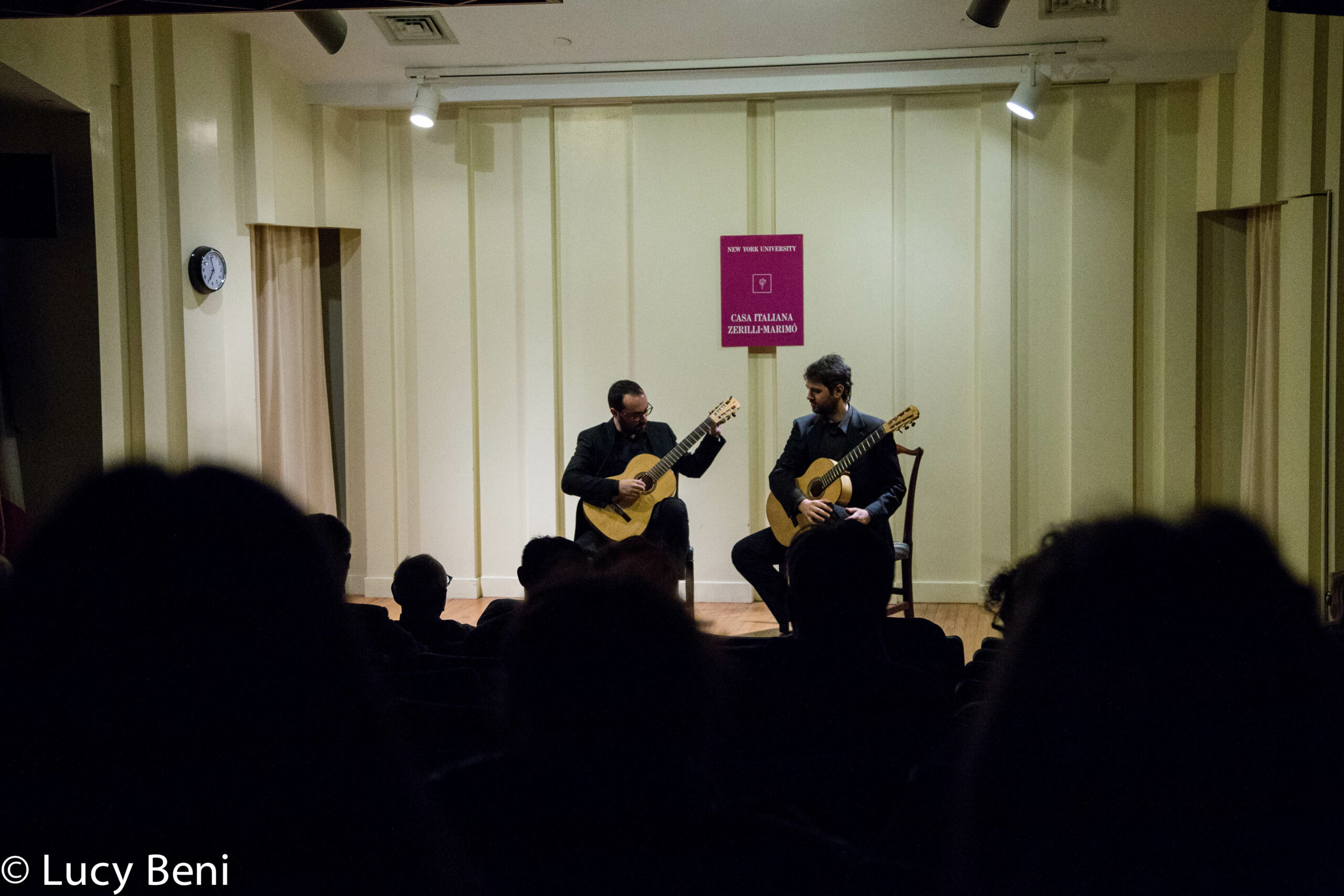 musician-playing-guitar-from-concert-duo-scarlatti-guitar-duo-at-casa-italiana