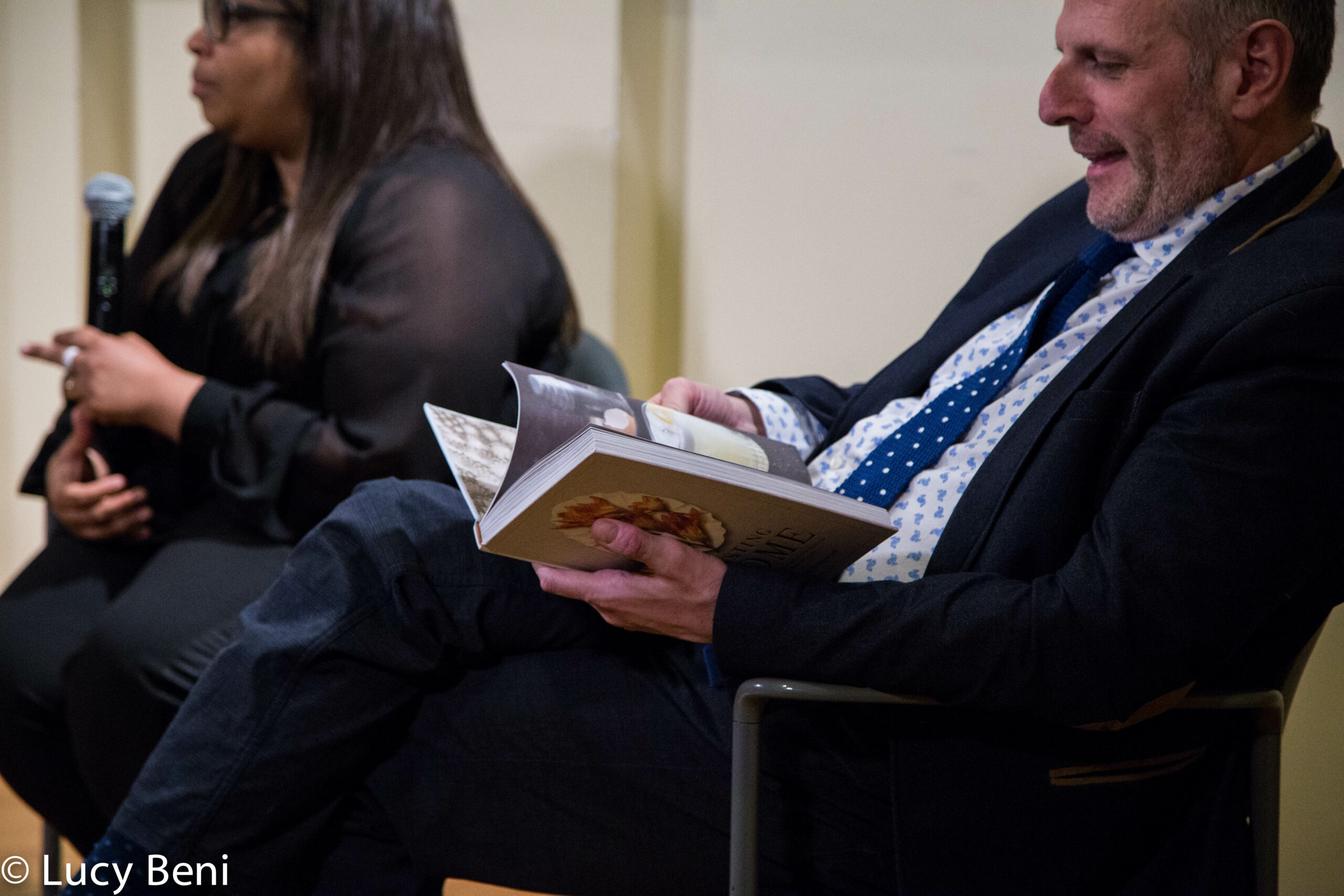 stefano-looking-at-the-book-from-book-presentation-tasting-rome-at-casa-italiana