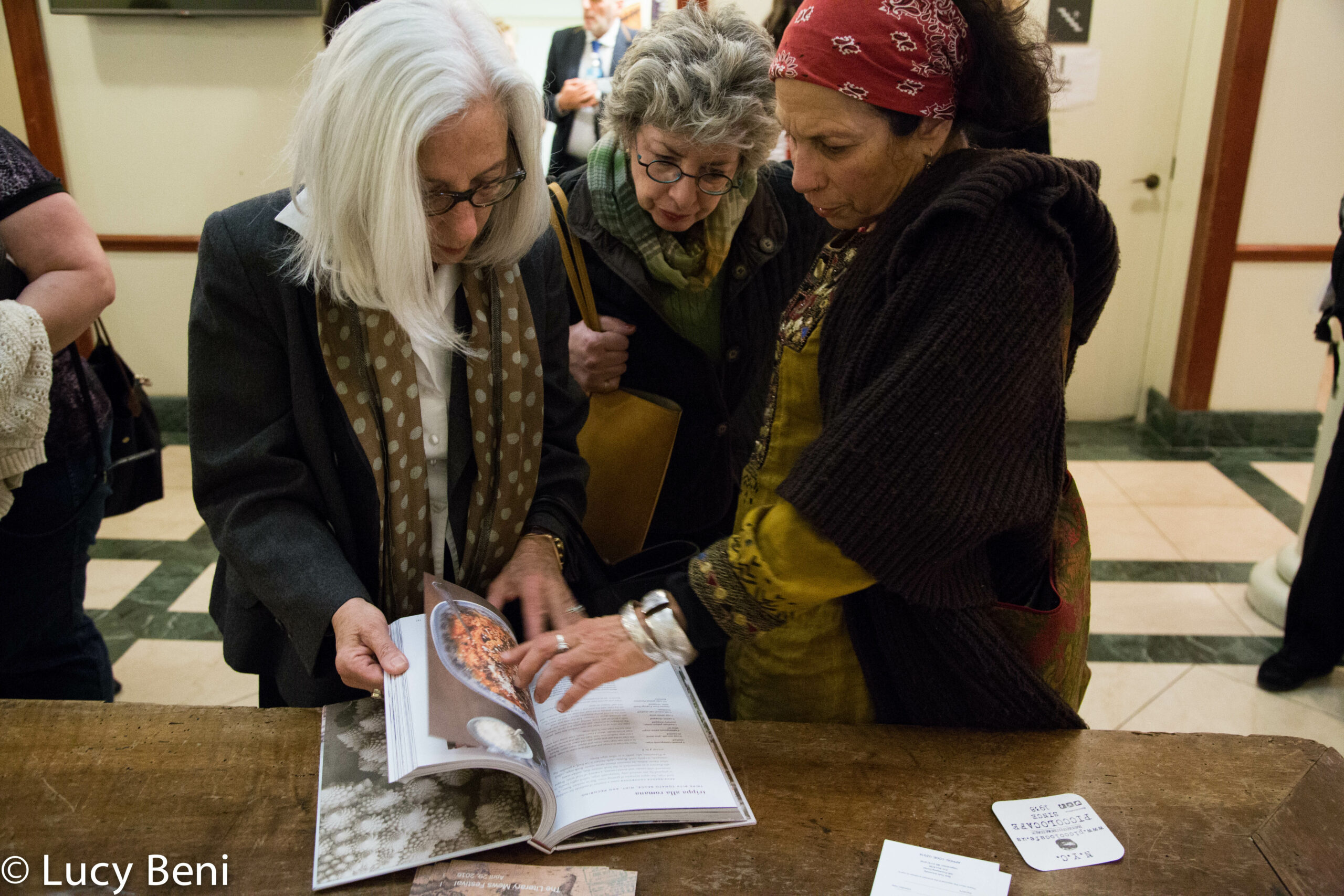 people-seeing-book-from-book-presentation-tasting-rome-at-casa-italiana