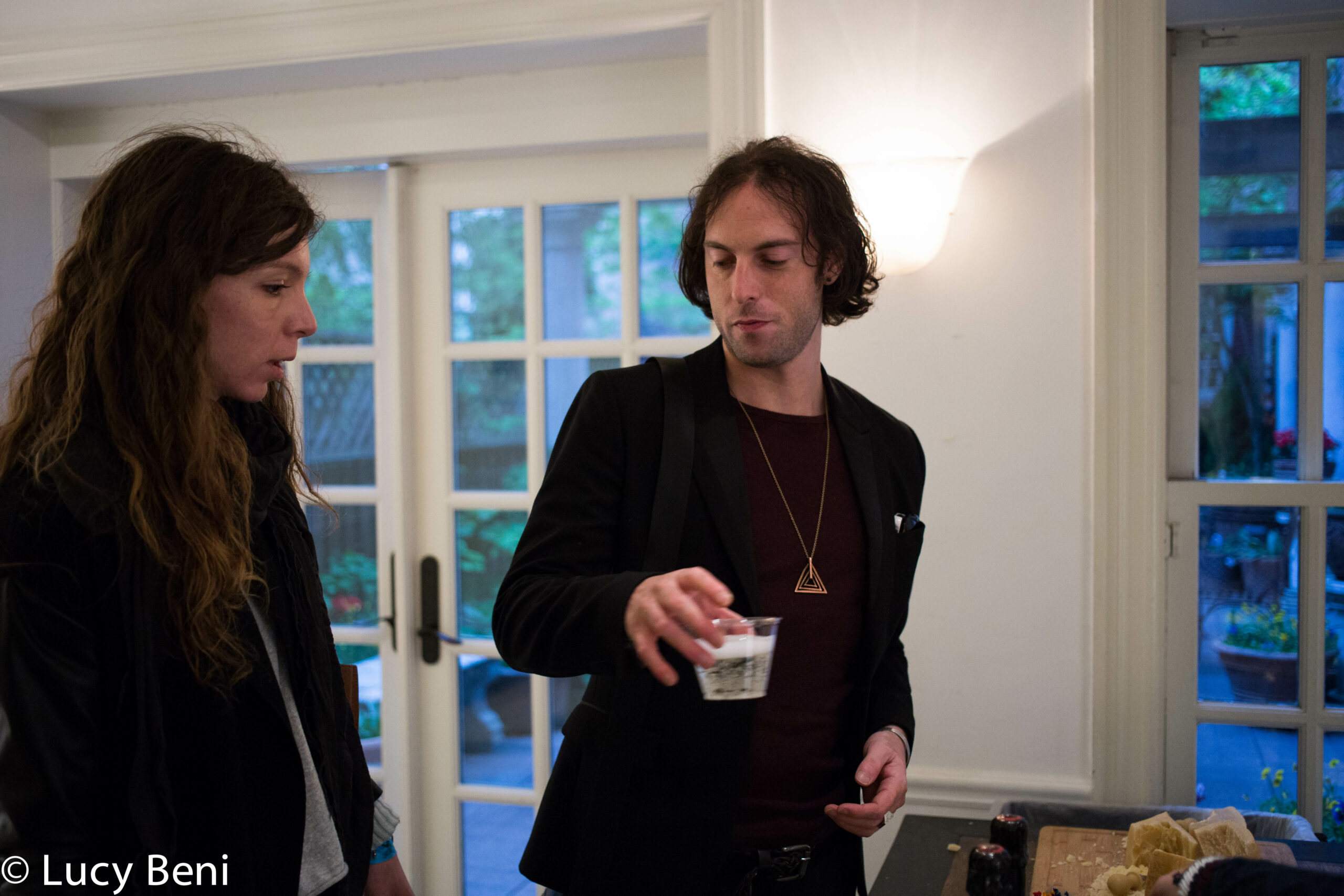 guests-interacting-from-exhibition-opening-luisa-gardini-at-casa-italiana
