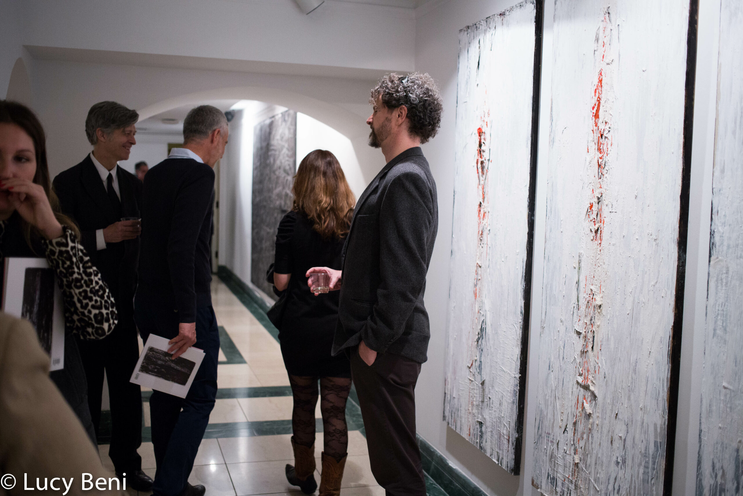guests-interacting-from-exhibition-opening-luisa-gardini-at-casa-italiana