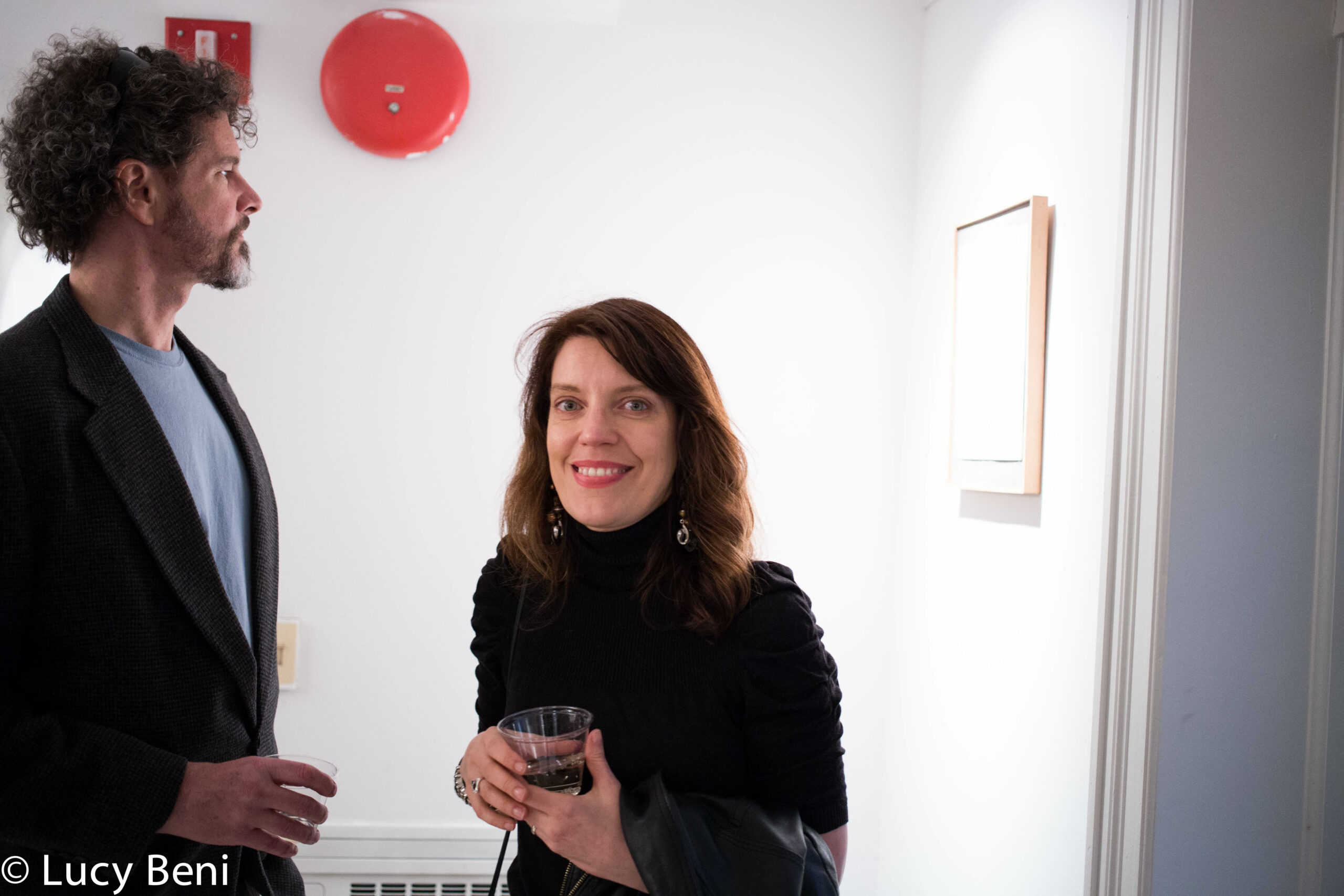 lady-smiling-from-exhibition-opening-luisa-gardini-at-casa-italiana