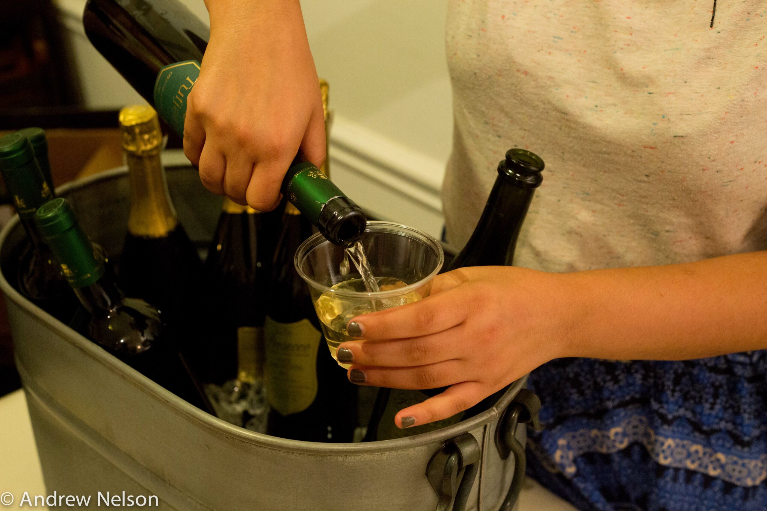 pouring-wine-in-glass-from-open-roads-2016-at-casa-italiana