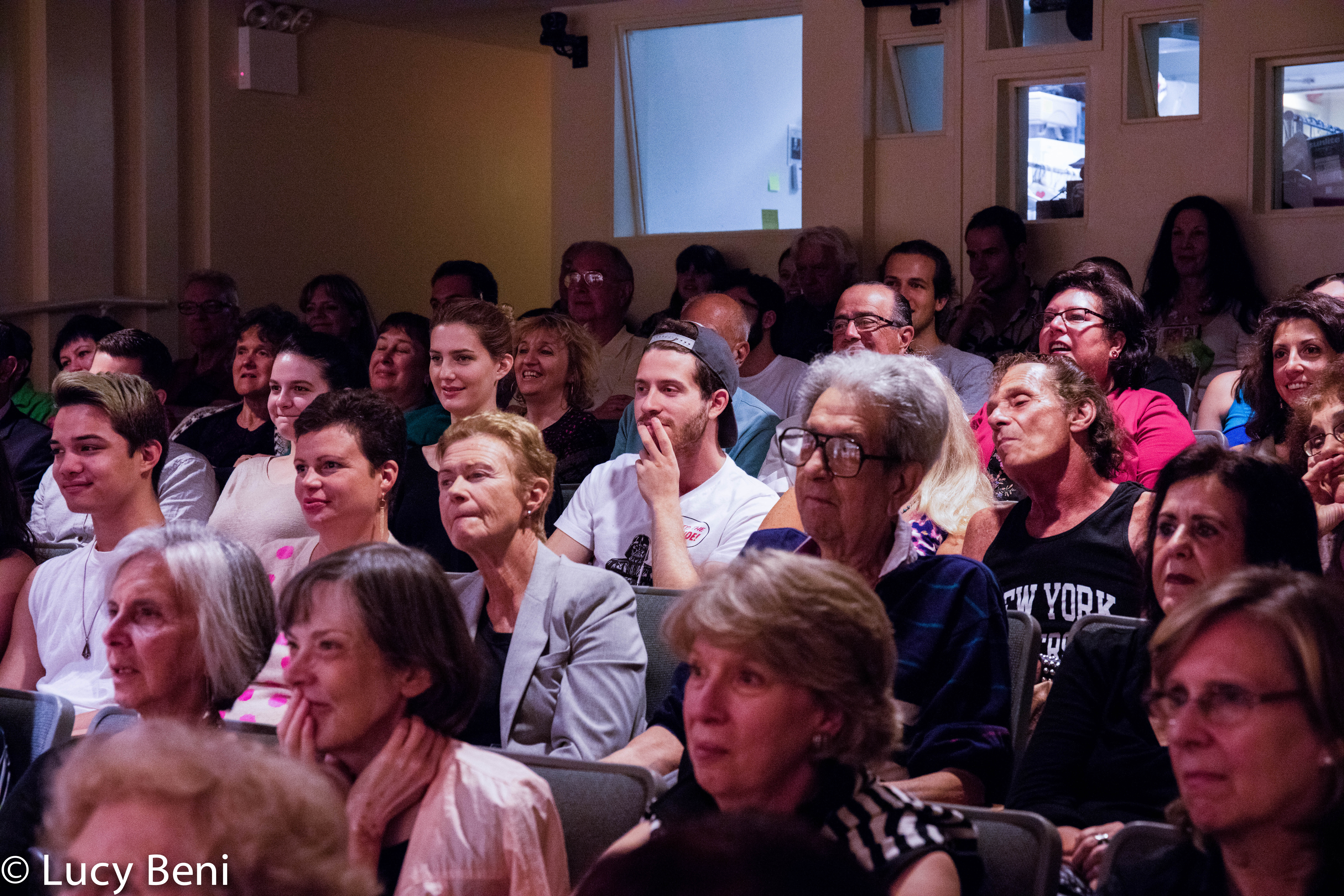 spectators-from-theatrical-performance-the-misers-daughter-at-casa-italiana