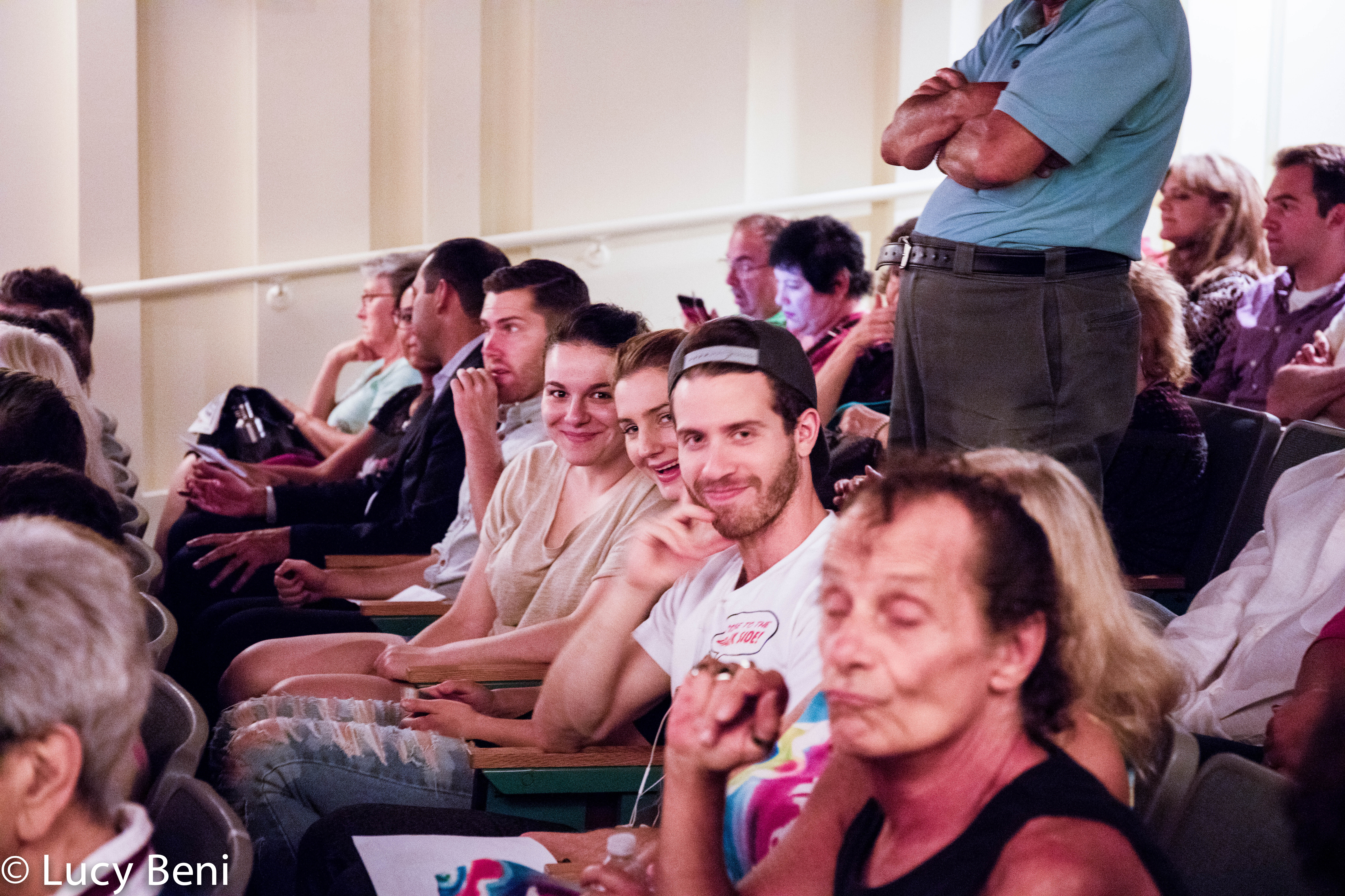 spectators-smiling-from-theatrical-performance-the-misers-daughter-at-casa-italiana
