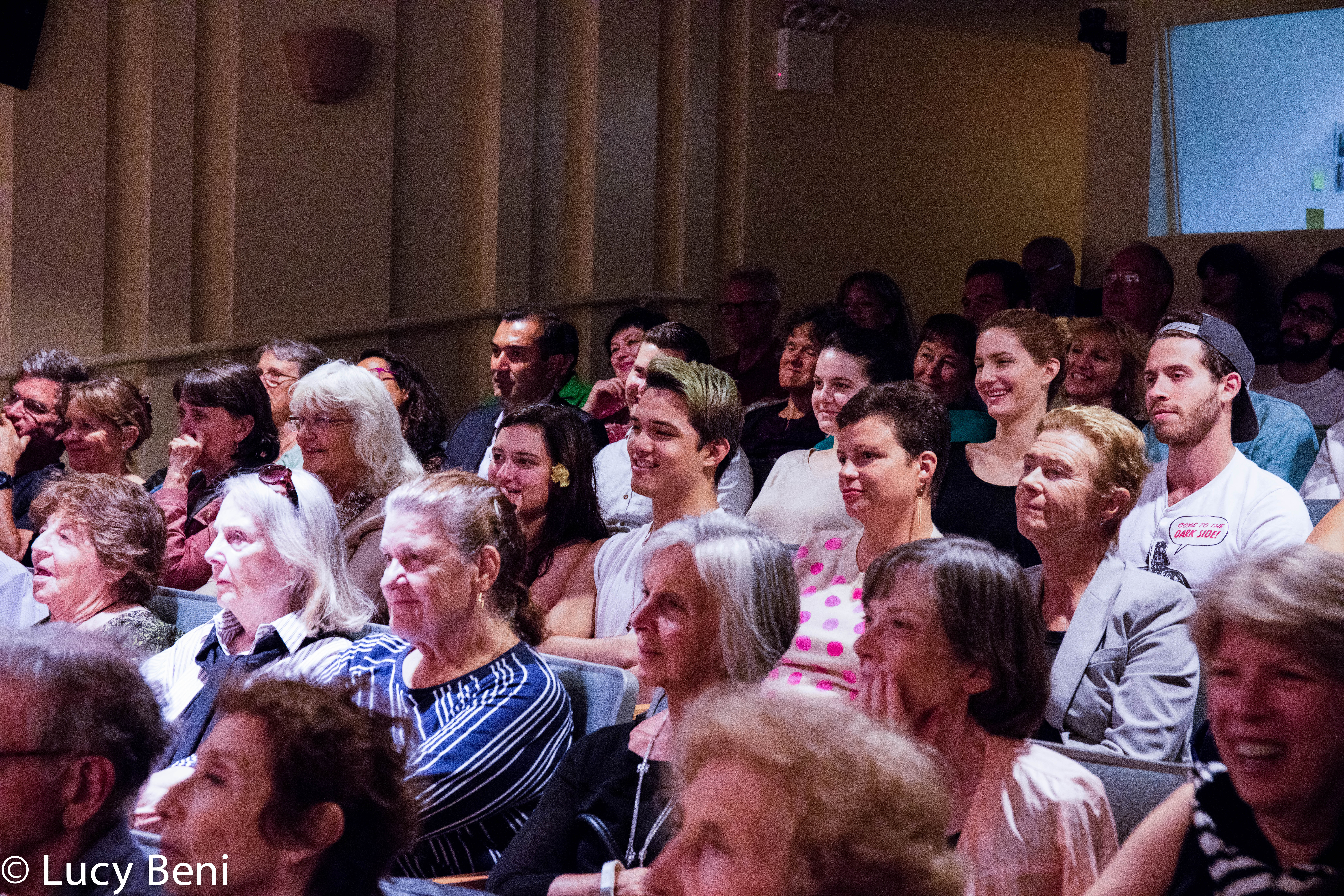 spectators-from-theatrical-performance-the-misers-daughter-at-casa-italiana