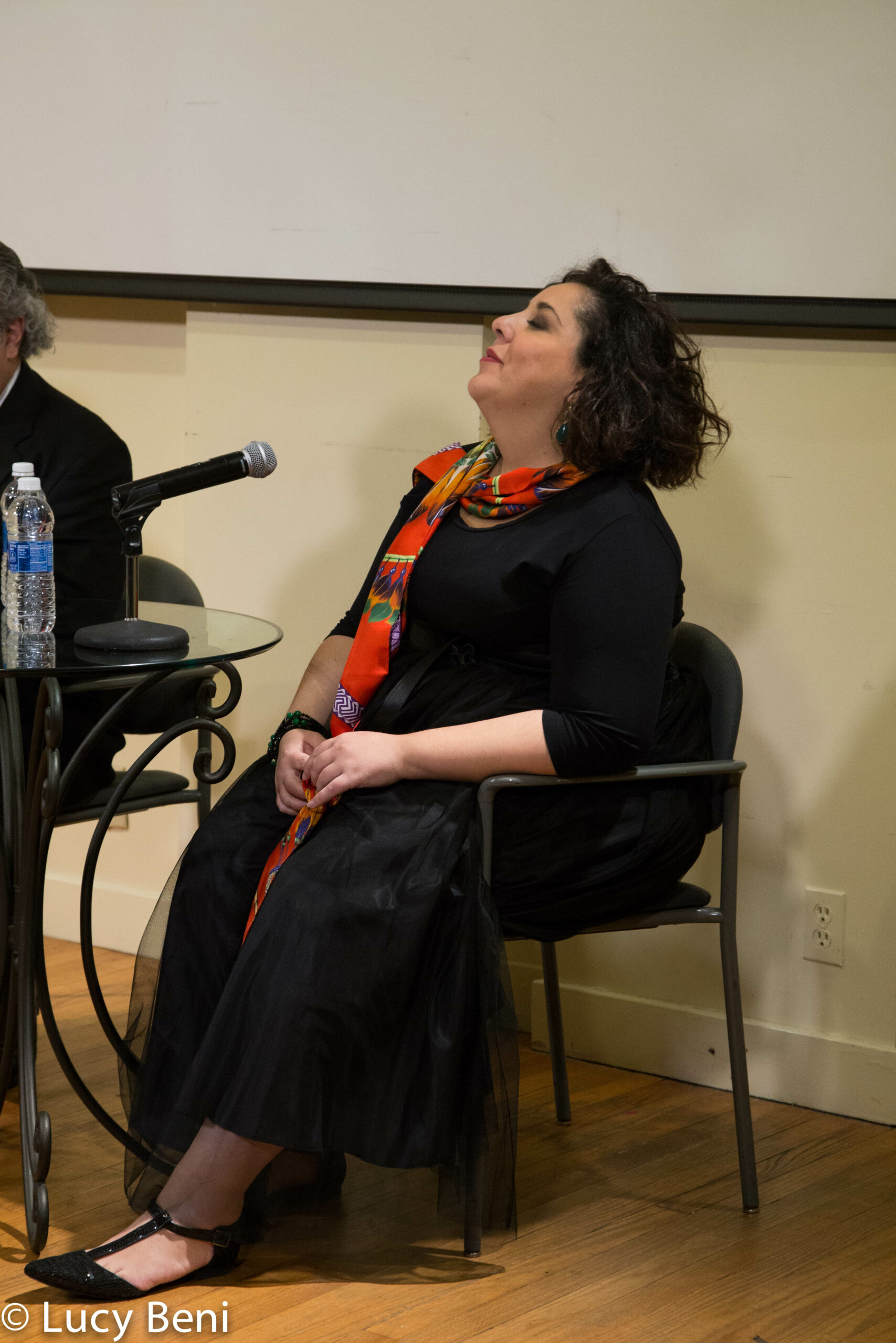 speaker-looking-up-from-adventures-in-italian-opera-marianna-pizzolato-at-casa-italiana