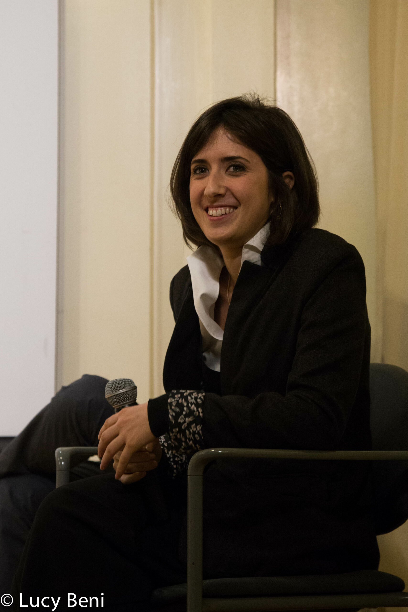 speaker-smiling-from-gallery-talk-at-casa-italiana