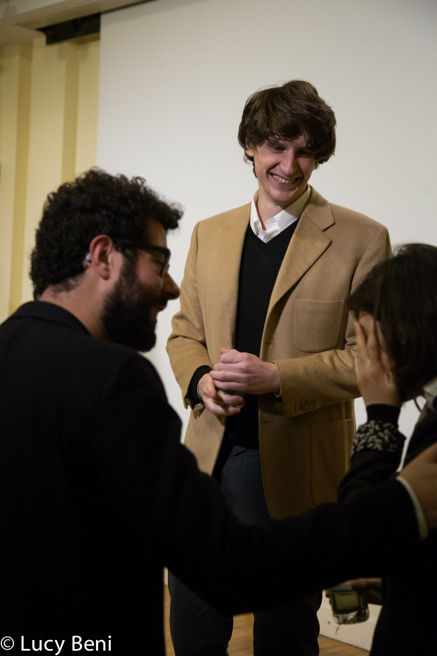 speaker-interacting-with-guests-from-gallery-talk-at-casa-italiana