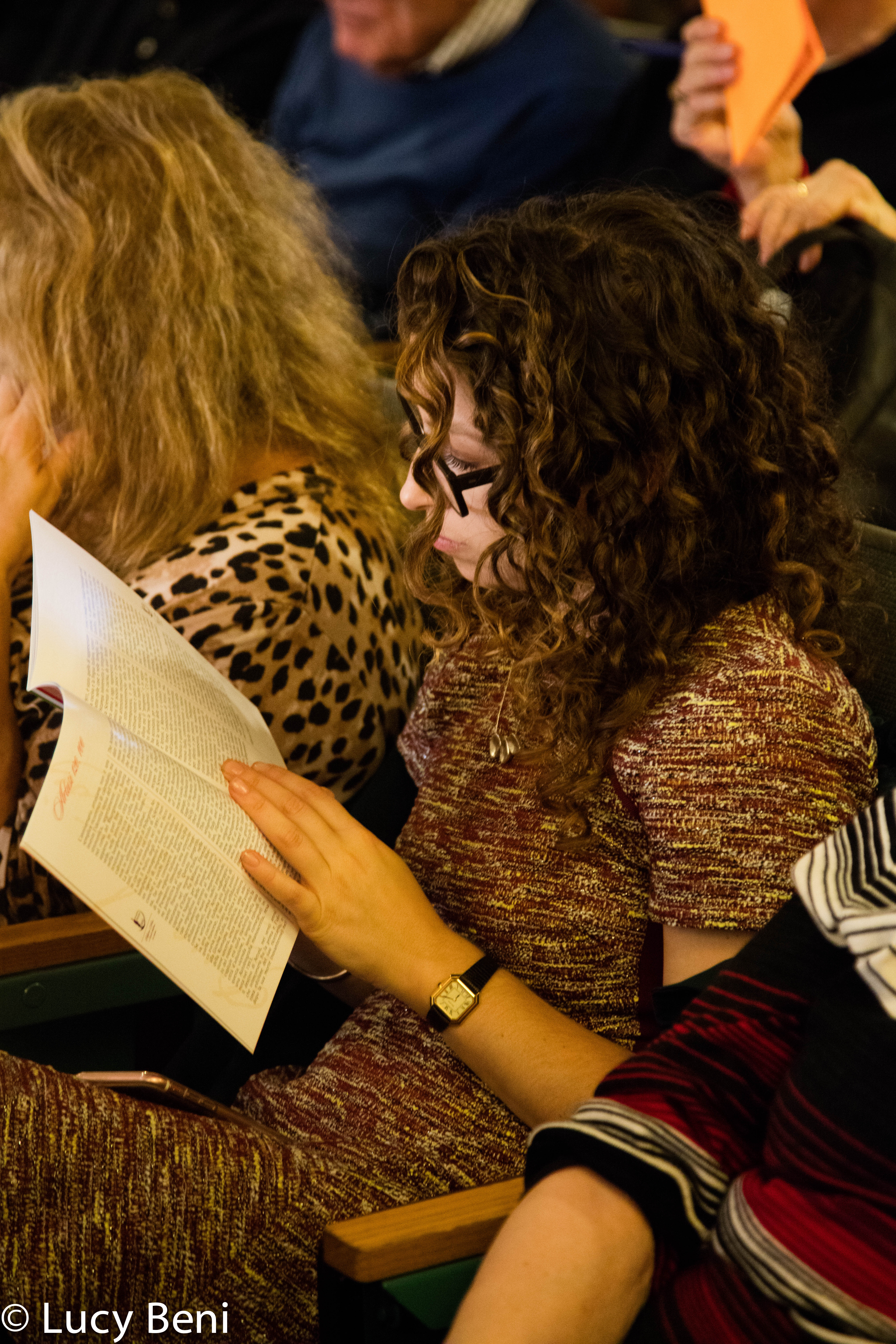 spectator-reading-book-from-the-feast-days-food-in-artusi-cuisine-at-casa-italiana