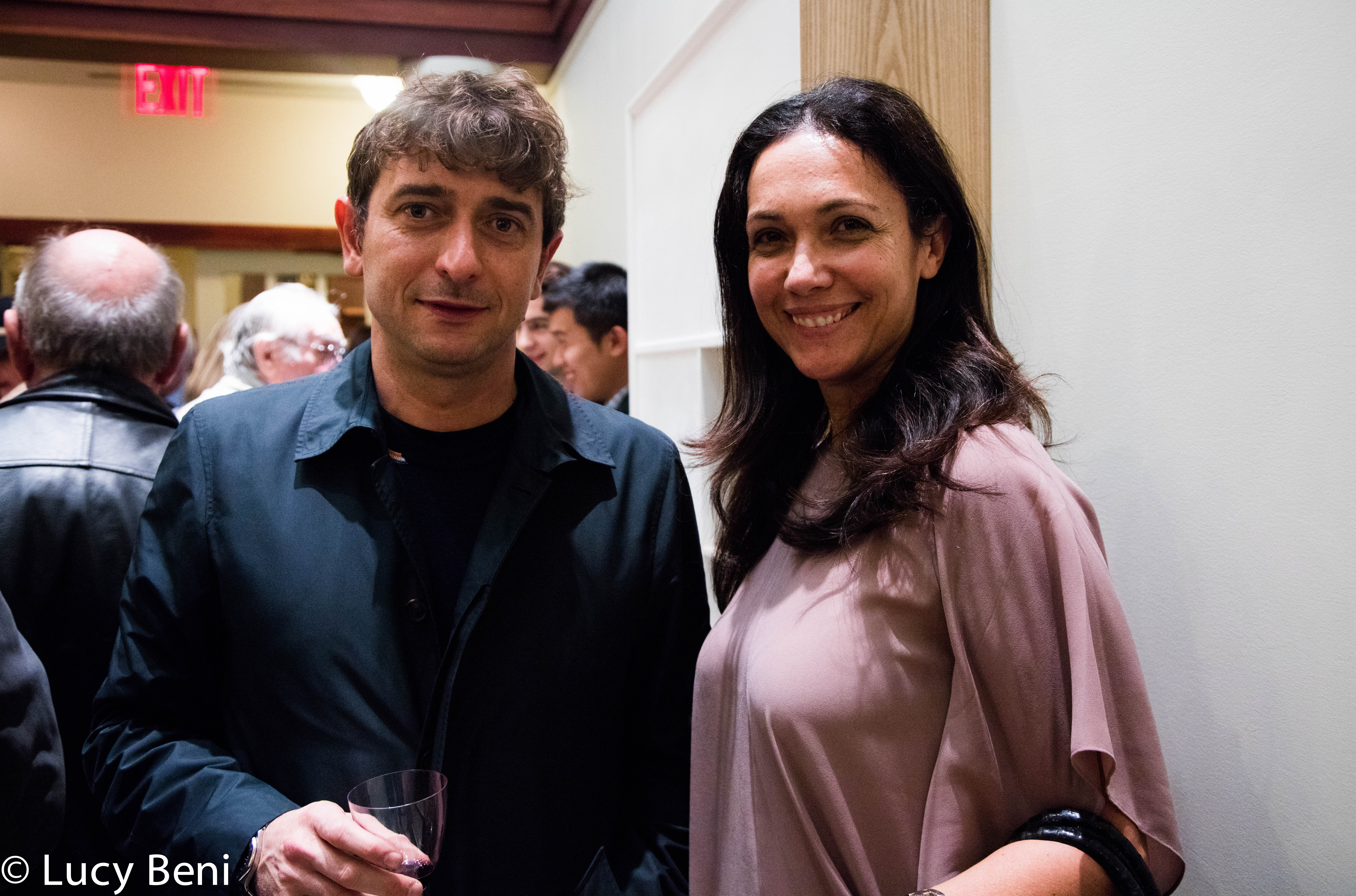 man-and-lady-smiling-from-the-feast-days-food-in-artusi-cuisine-at-casa-italiana