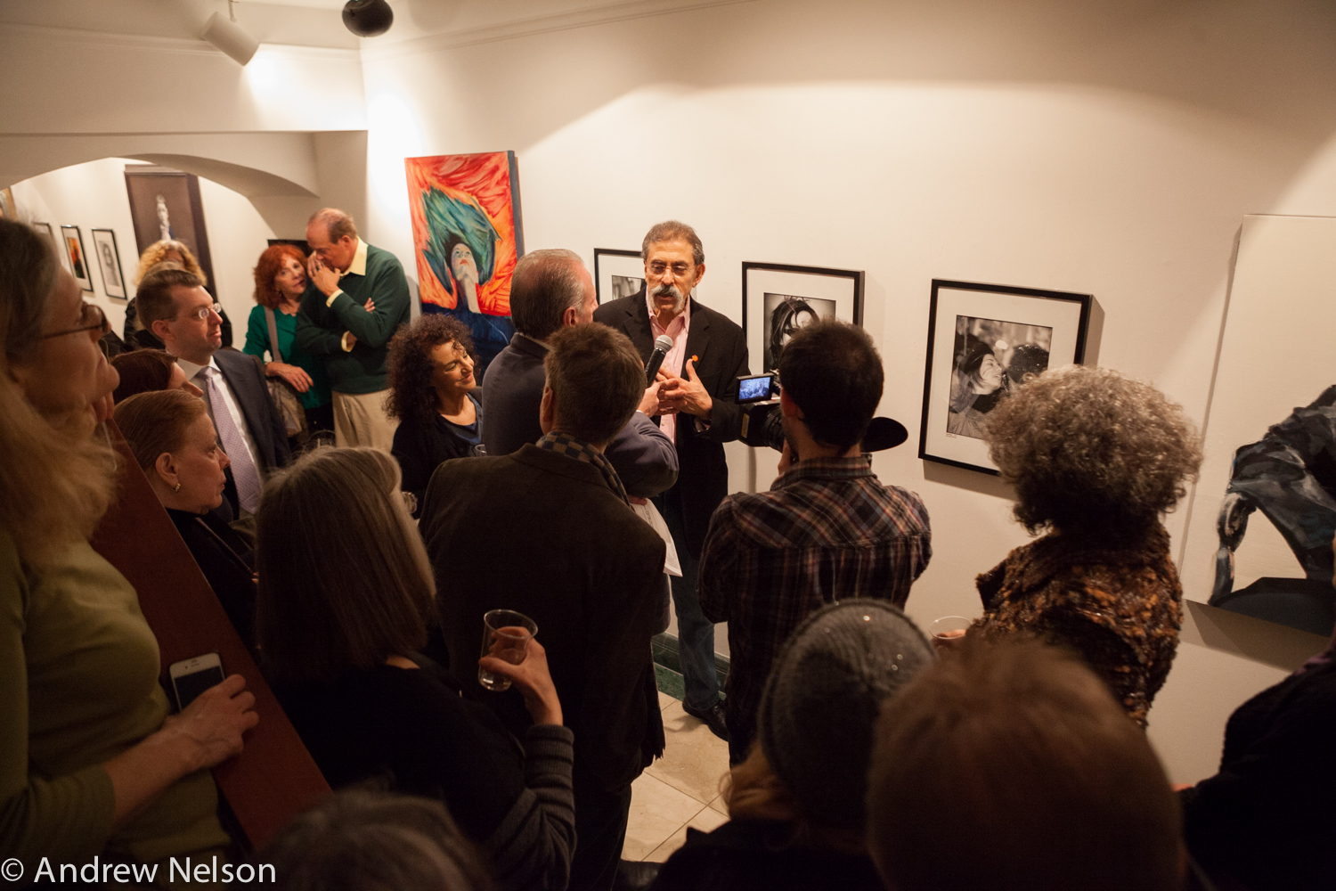 stefano-interviewing-a-man-from-iavanet-exhibition-opening-at-casa-italiana