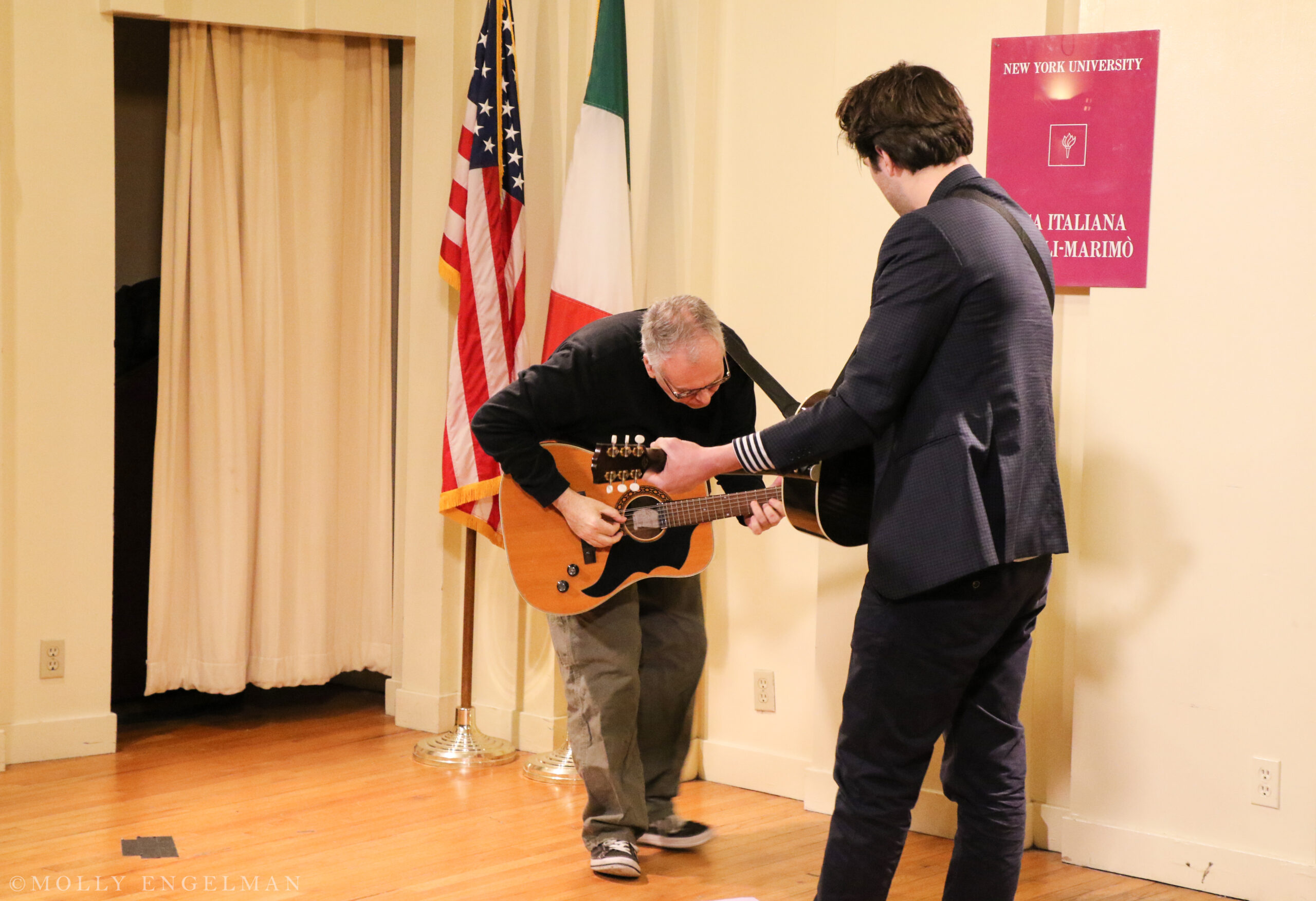 musician-playing-guitar-from-fabio-caninos-rainbow-republic-a-book-presentation-at-casa-italiana