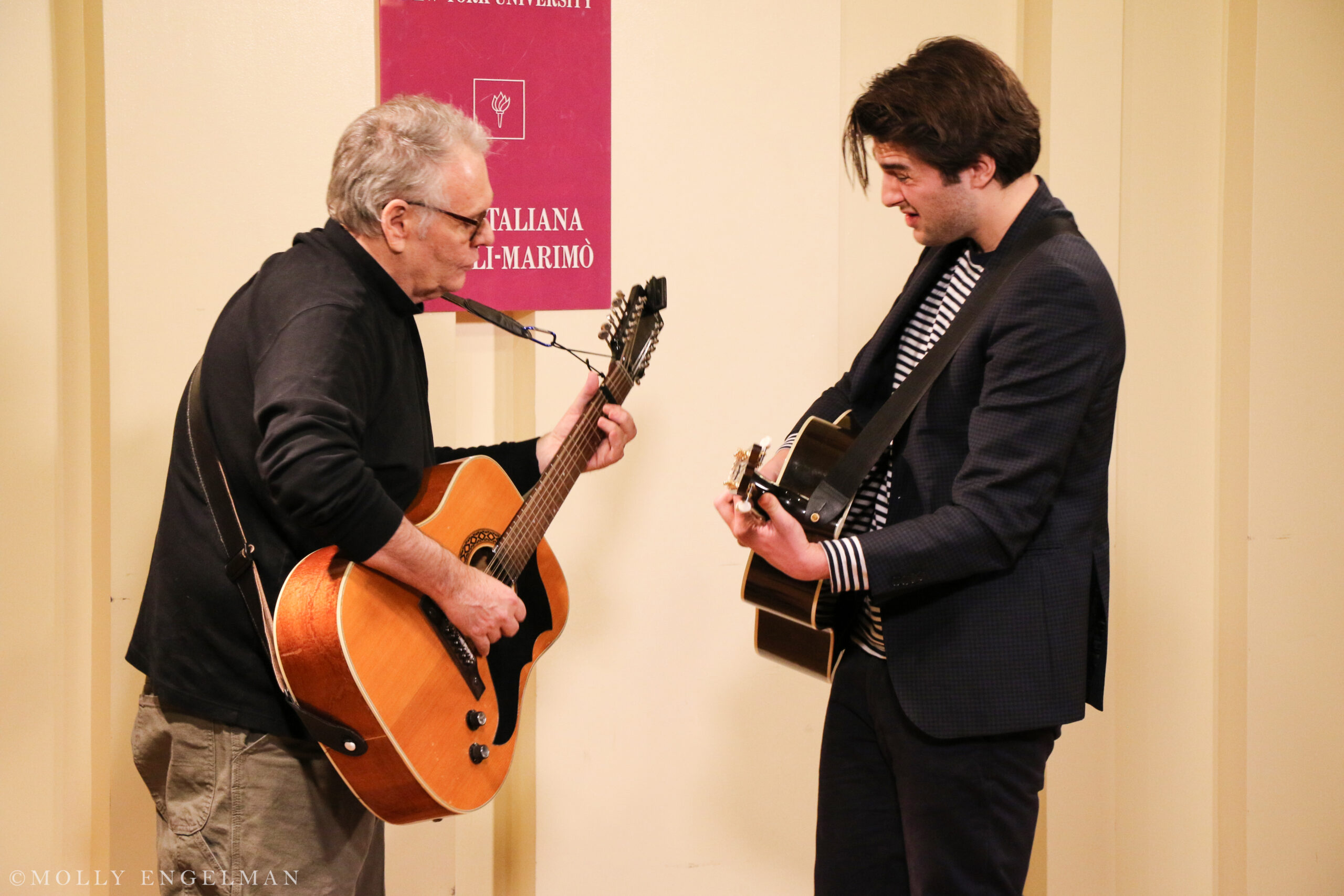 musician-playing-guitar-from-fabio-caninos-rainbow-republic-a-book-presentation-at-casa-italiana