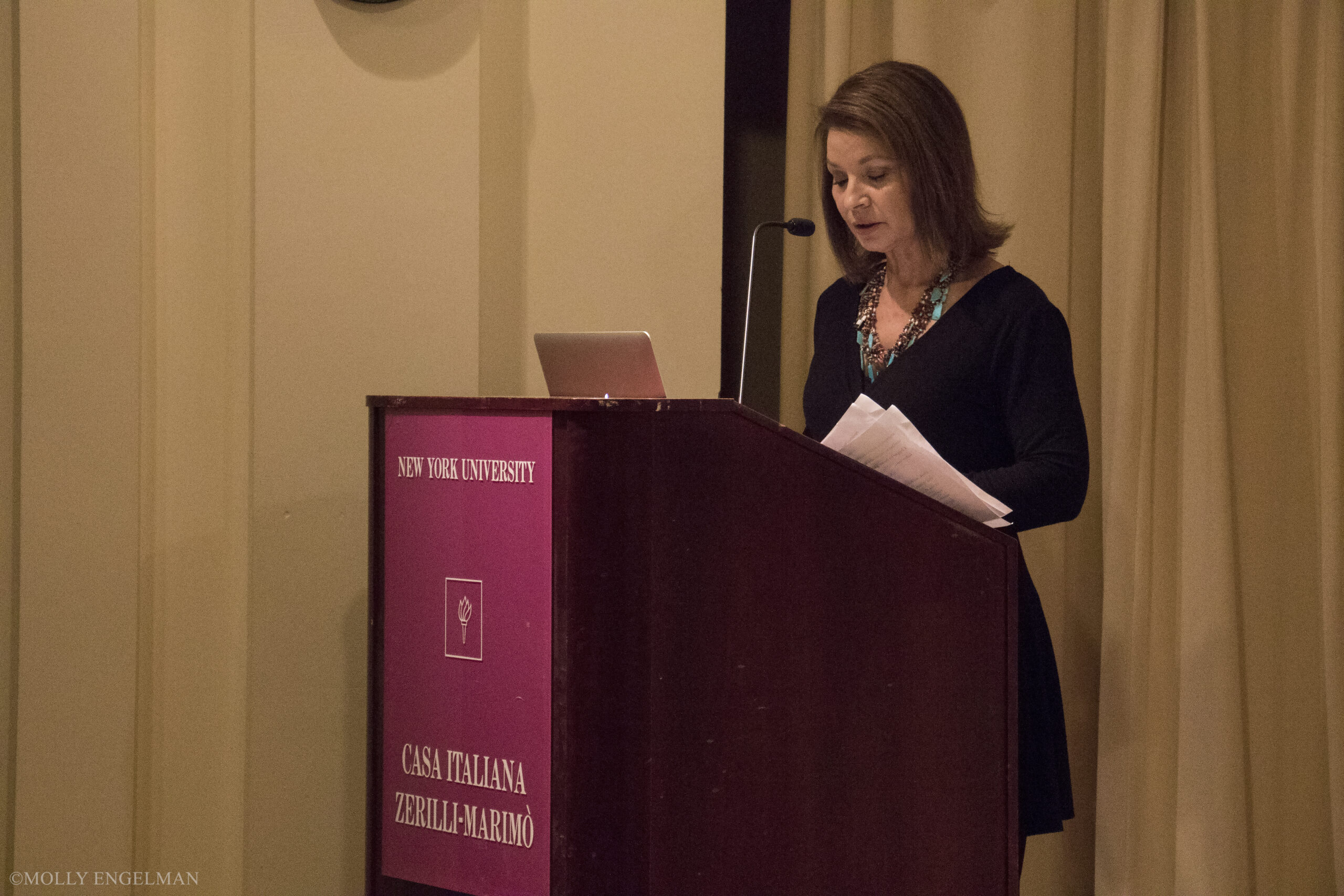 speaker-talking-from-book-presentation-at-casa-italiana